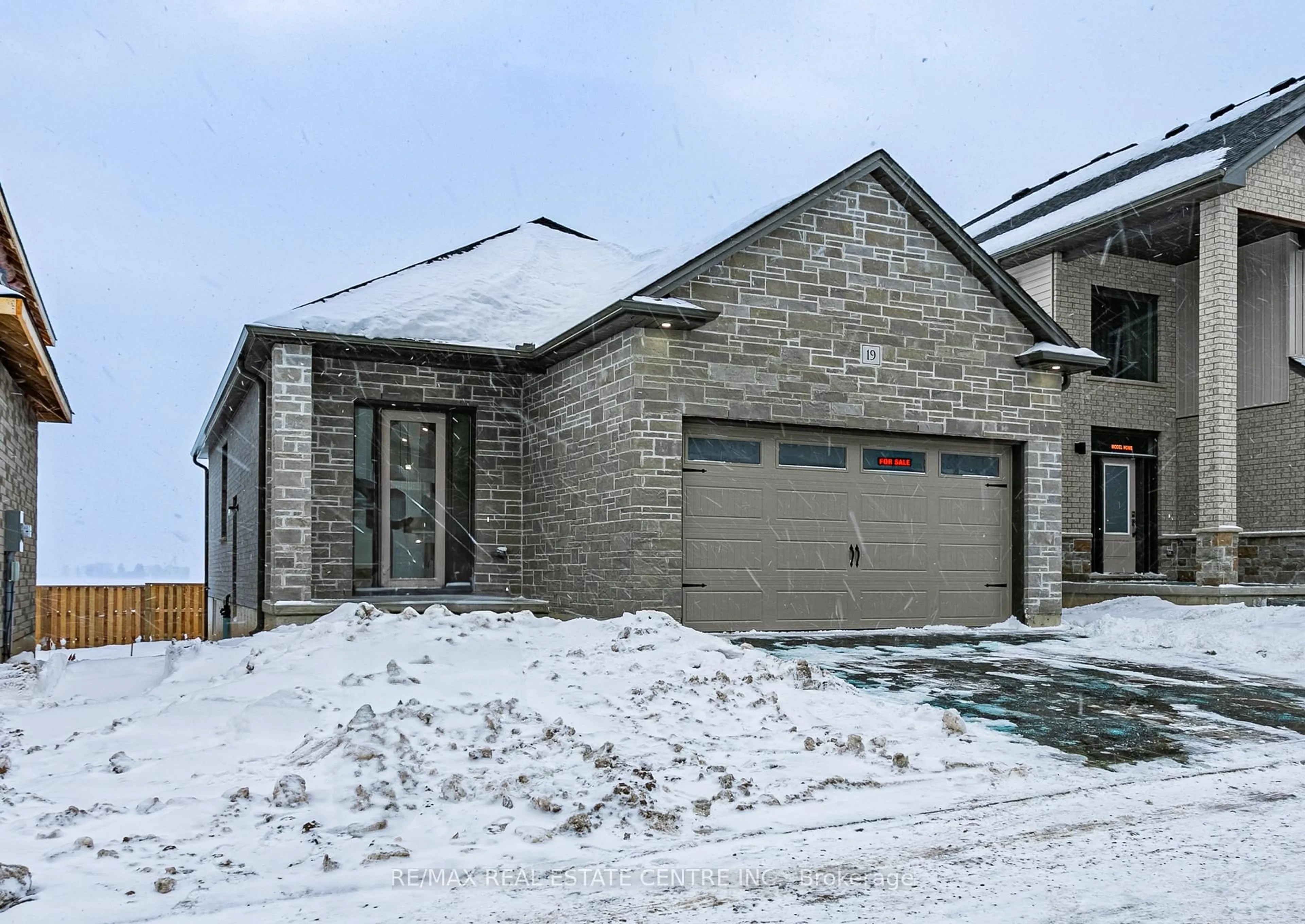 Home with brick exterior material, street for 7966 FALLON Dr #19, Lucan Biddulph Ontario N0M 1V0