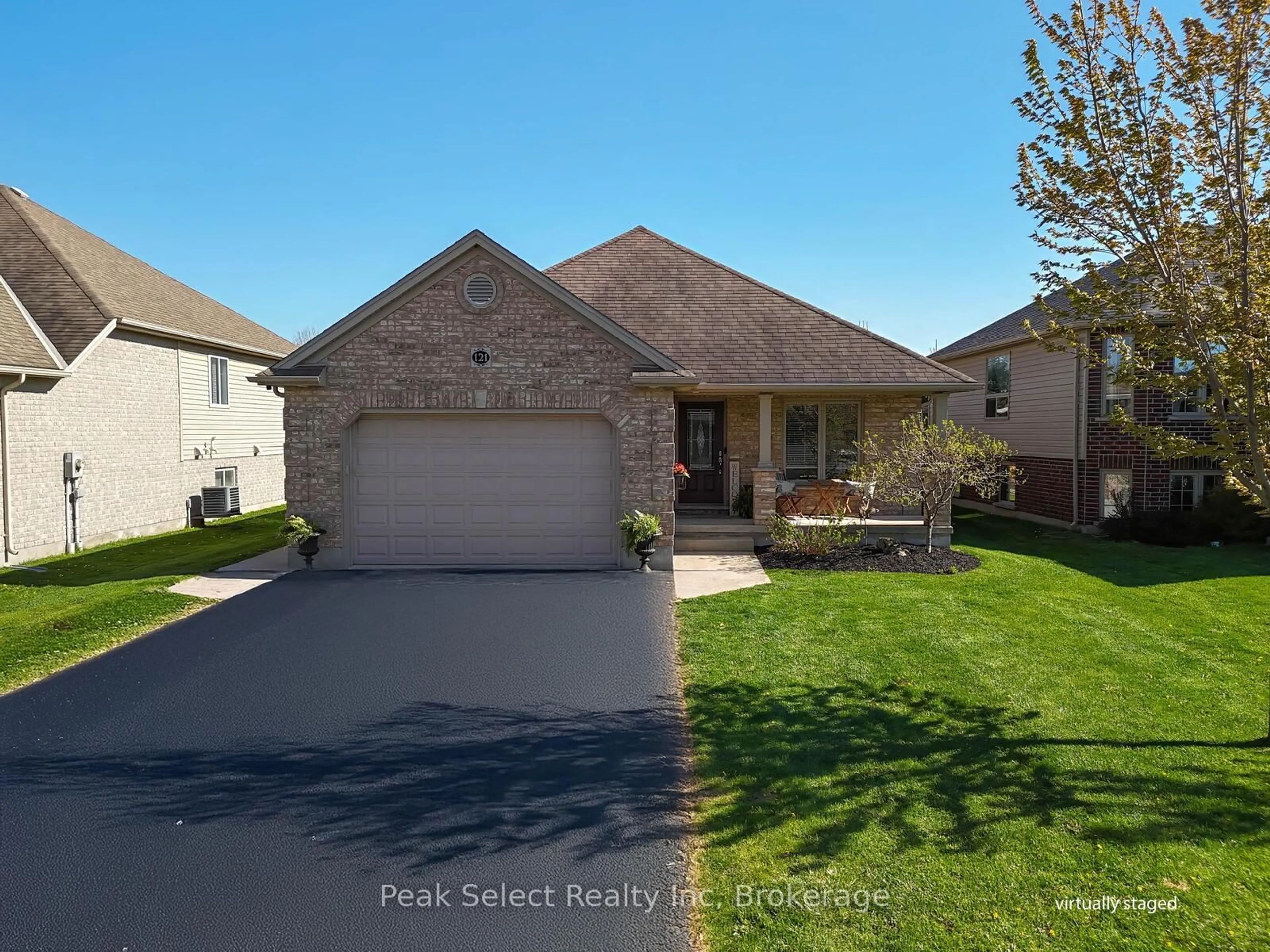 A pic from outside/outdoor area/front of a property/back of a property/a pic from drone, street for 121 Watson St, Lucan Biddulph Ontario N0M 2J0