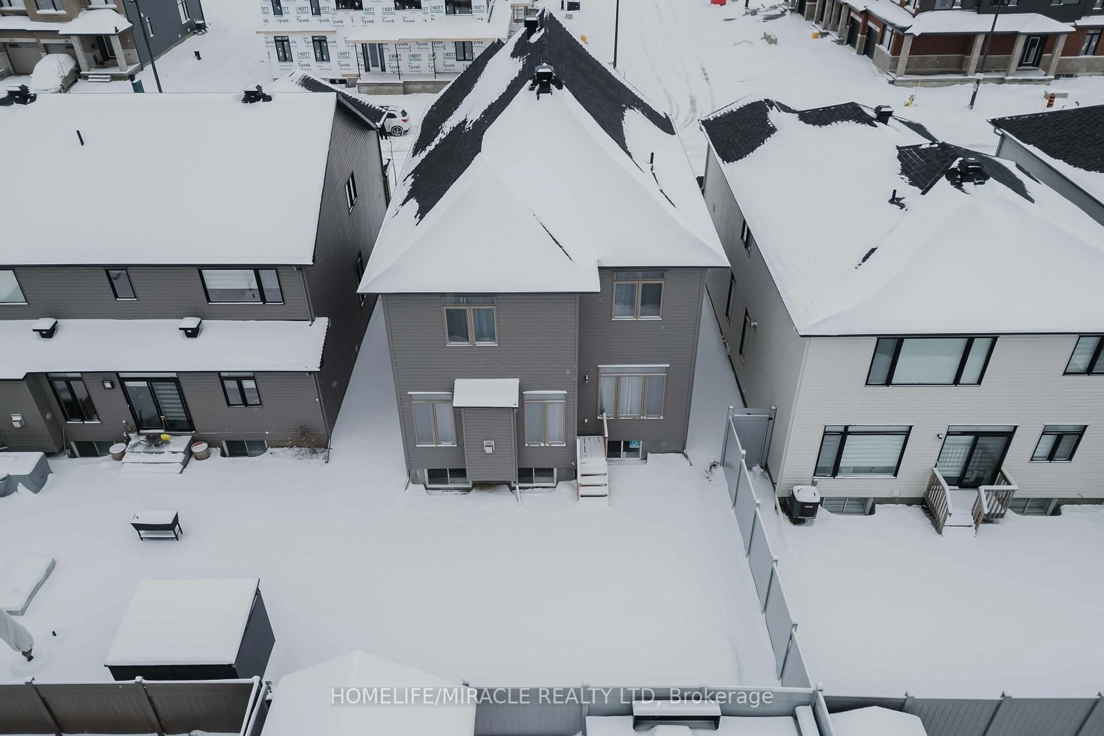 A pic from outside/outdoor area/front of a property/back of a property/a pic from drone, unknown for 815 Wooler Pl, Ottawa Ontario K1T 0X2