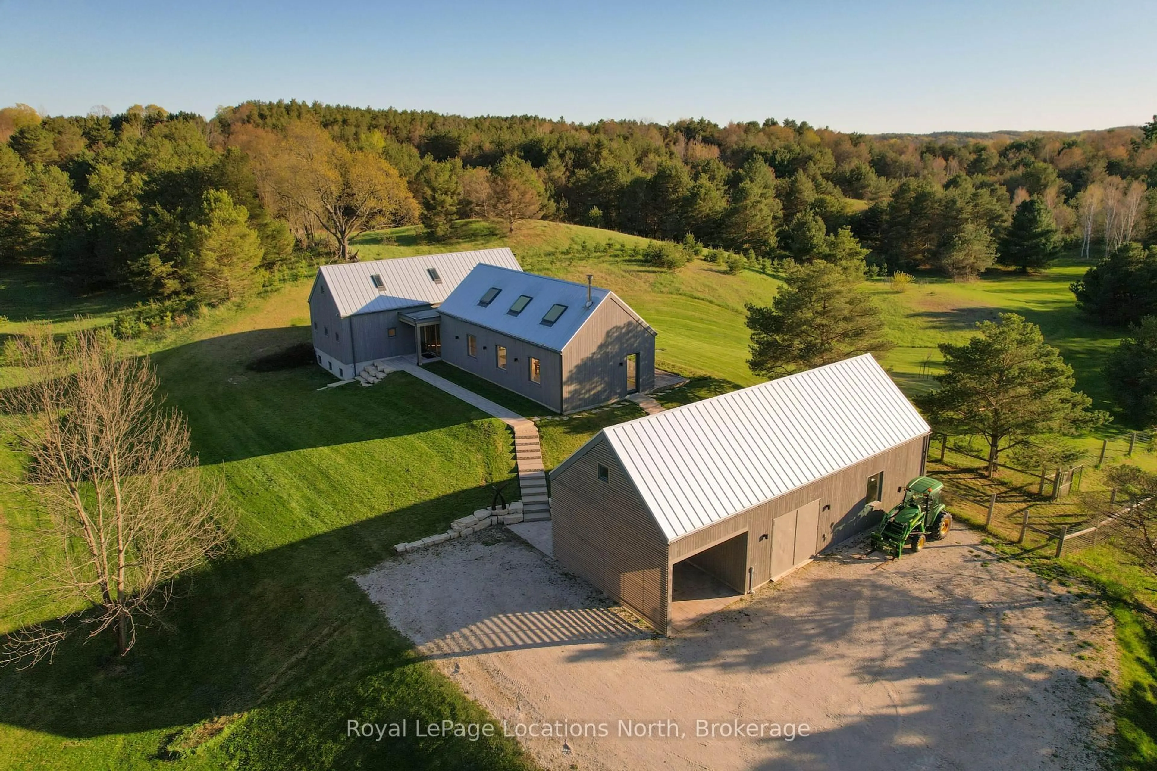 A pic from outside/outdoor area/front of a property/back of a property/a pic from drone, building for 938444 Airport Rd, Mulmur Ontario L9V 0M1