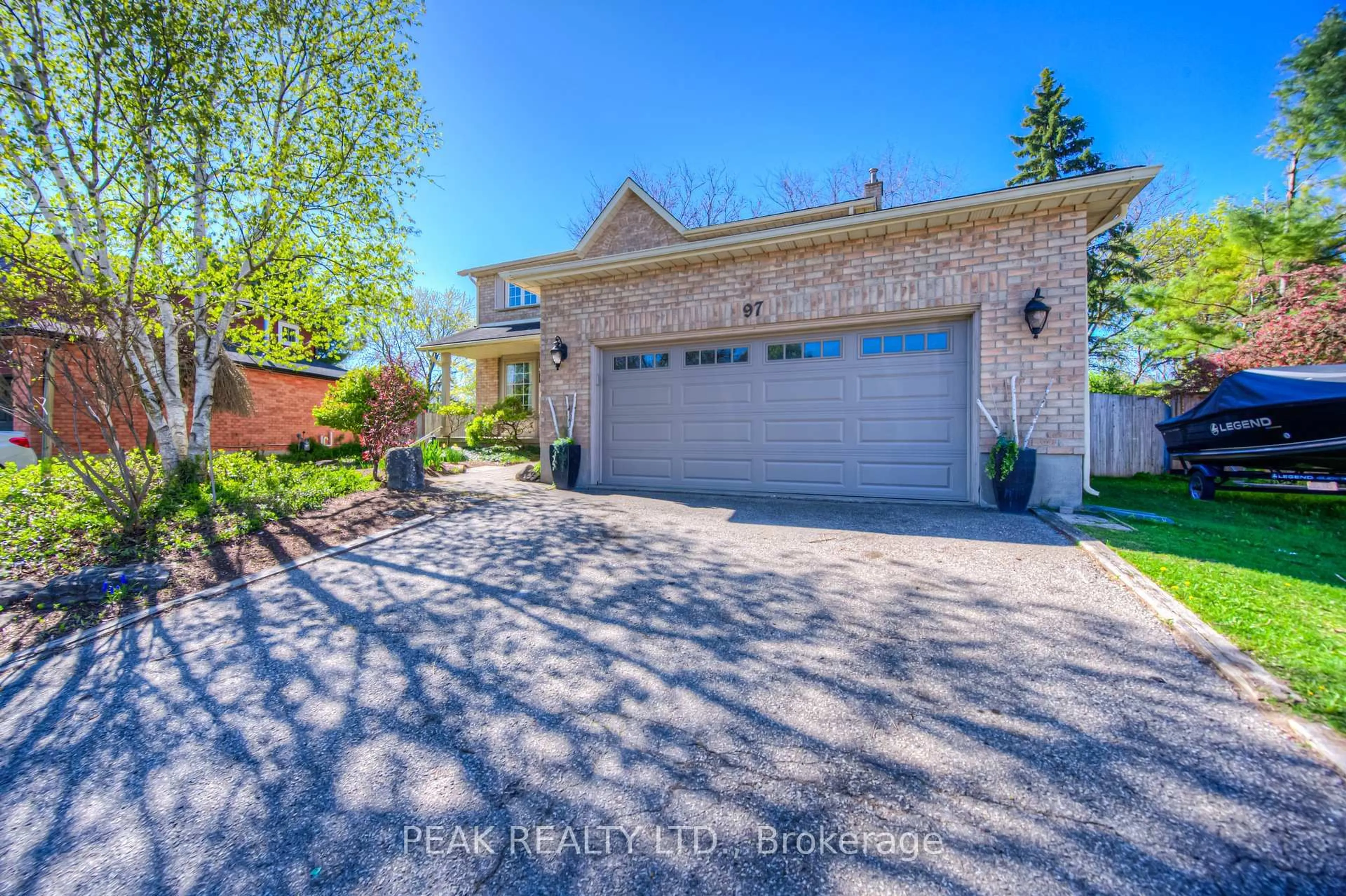 Home with brick exterior material, street for 97 Rushbrook Dr, Kitchener Ontario N2E 3C8