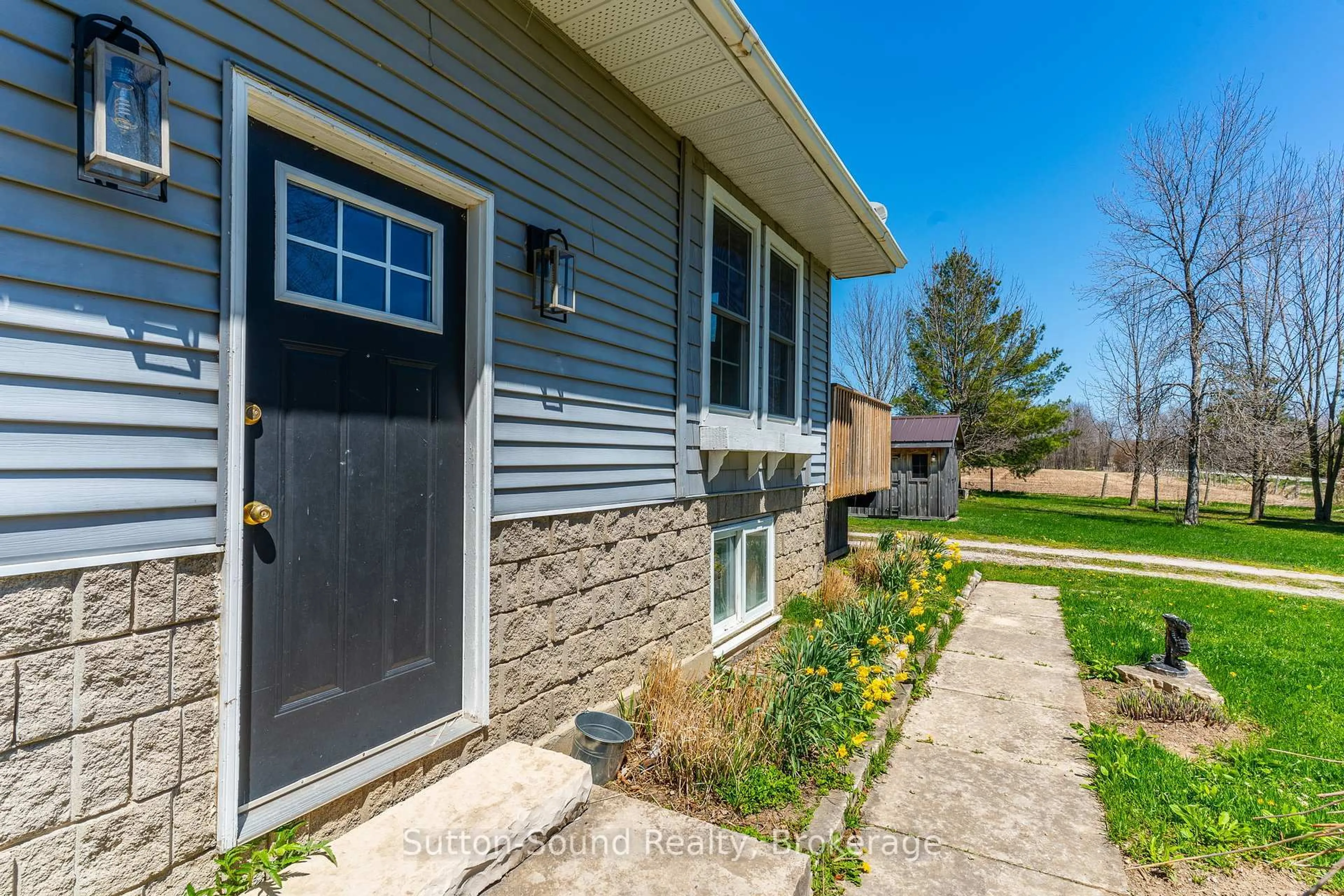 Home with vinyl exterior material, street for 17 Mar Side Rd Sdrd, South Bruce Peninsula Ontario N0H 2T0