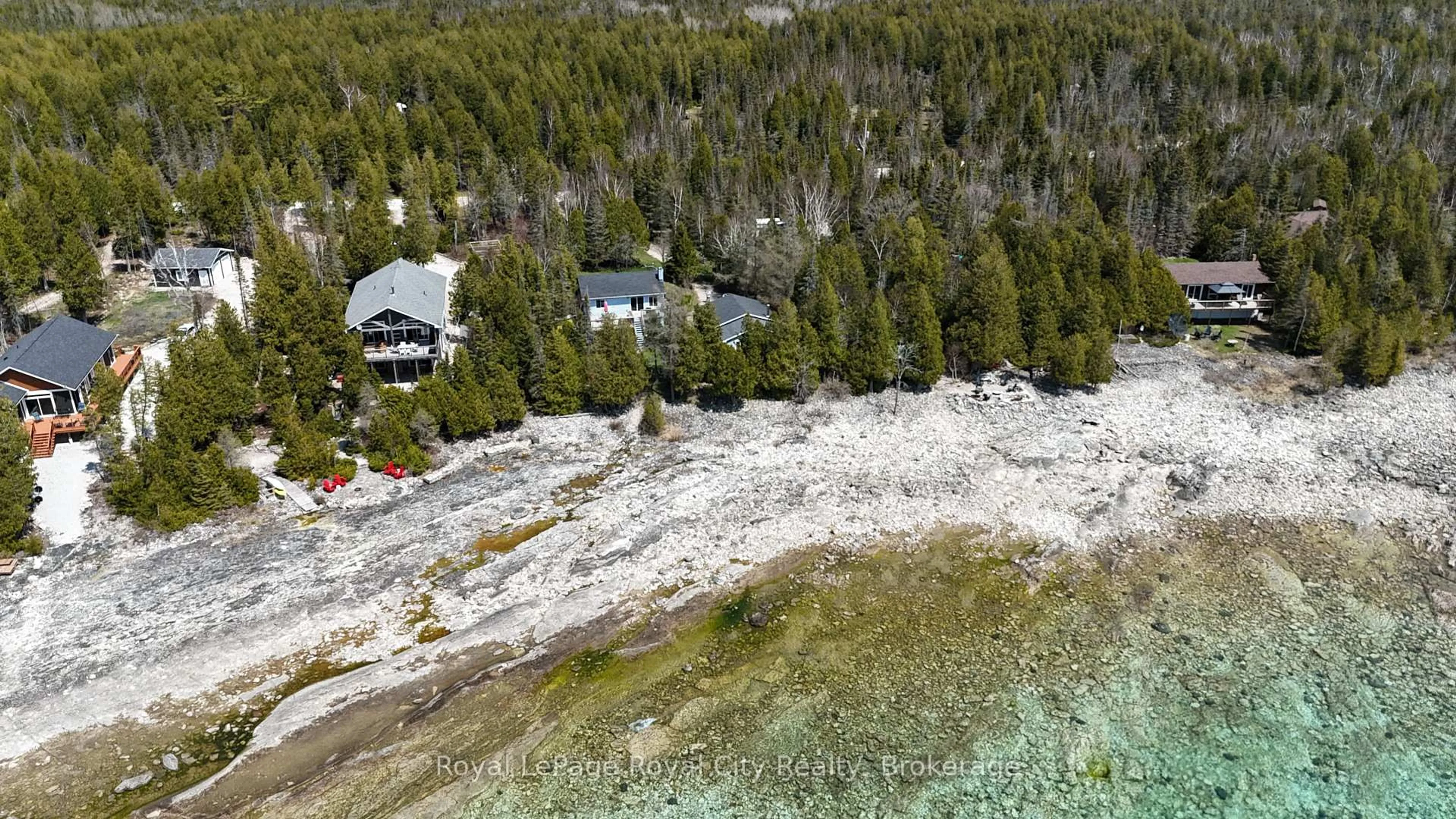 A pic from outside/outdoor area/front of a property/back of a property/a pic from drone, water/lake/river/ocean view for 1100 Dorcas Bay Rd, Northern Bruce Peninsula Ontario N0H 2R0