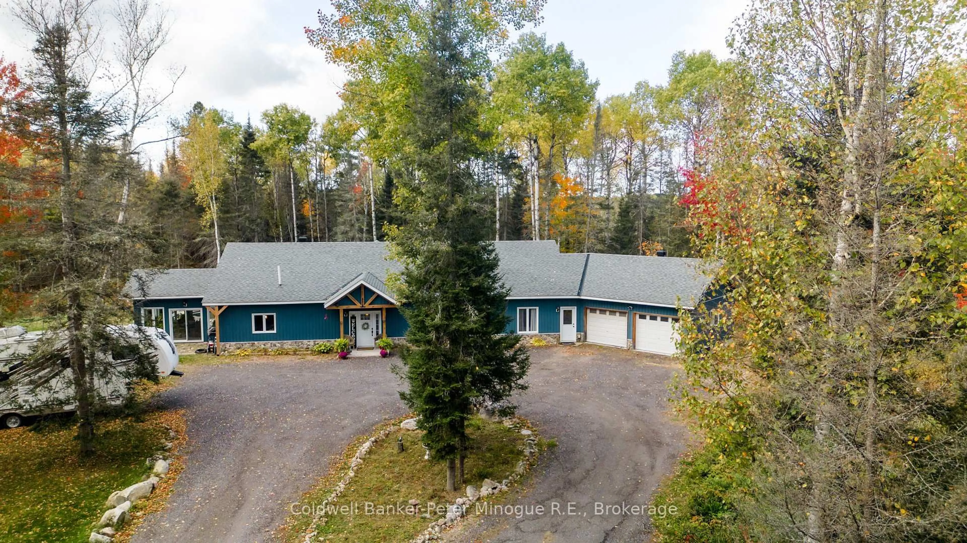 A pic from outside/outdoor area/front of a property/back of a property/a pic from drone, forest/trees view for 82 Highway 94 Highway, East Ferris Ontario P0H 1K0