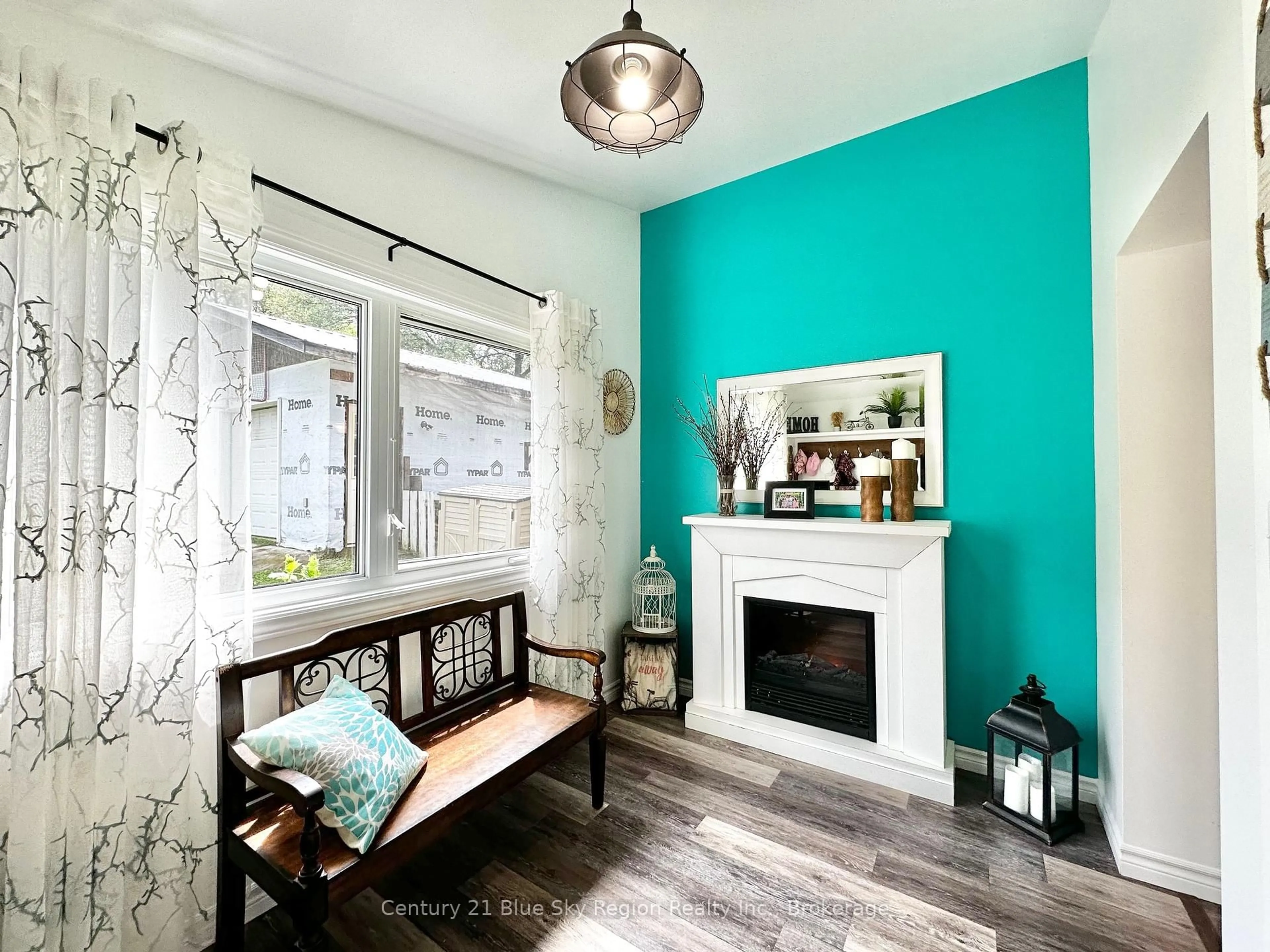 Living room with furniture, wood/laminate floor for 1065 JAMES St, Mattawa Ontario P0H 1V0
