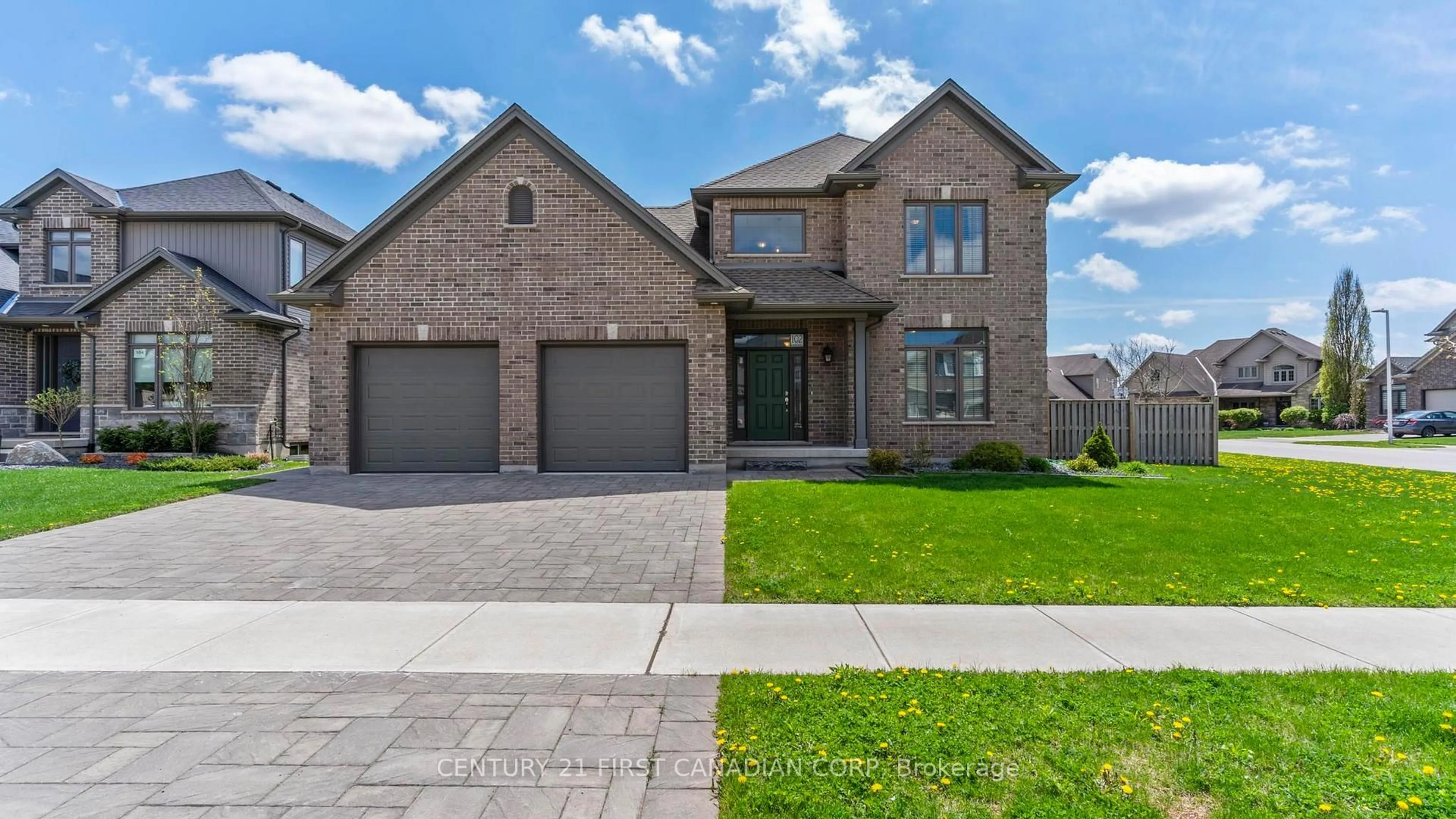 Home with brick exterior material, street for 102 Caverhill Cres, Middlesex Centre Ontario N0L 1R0