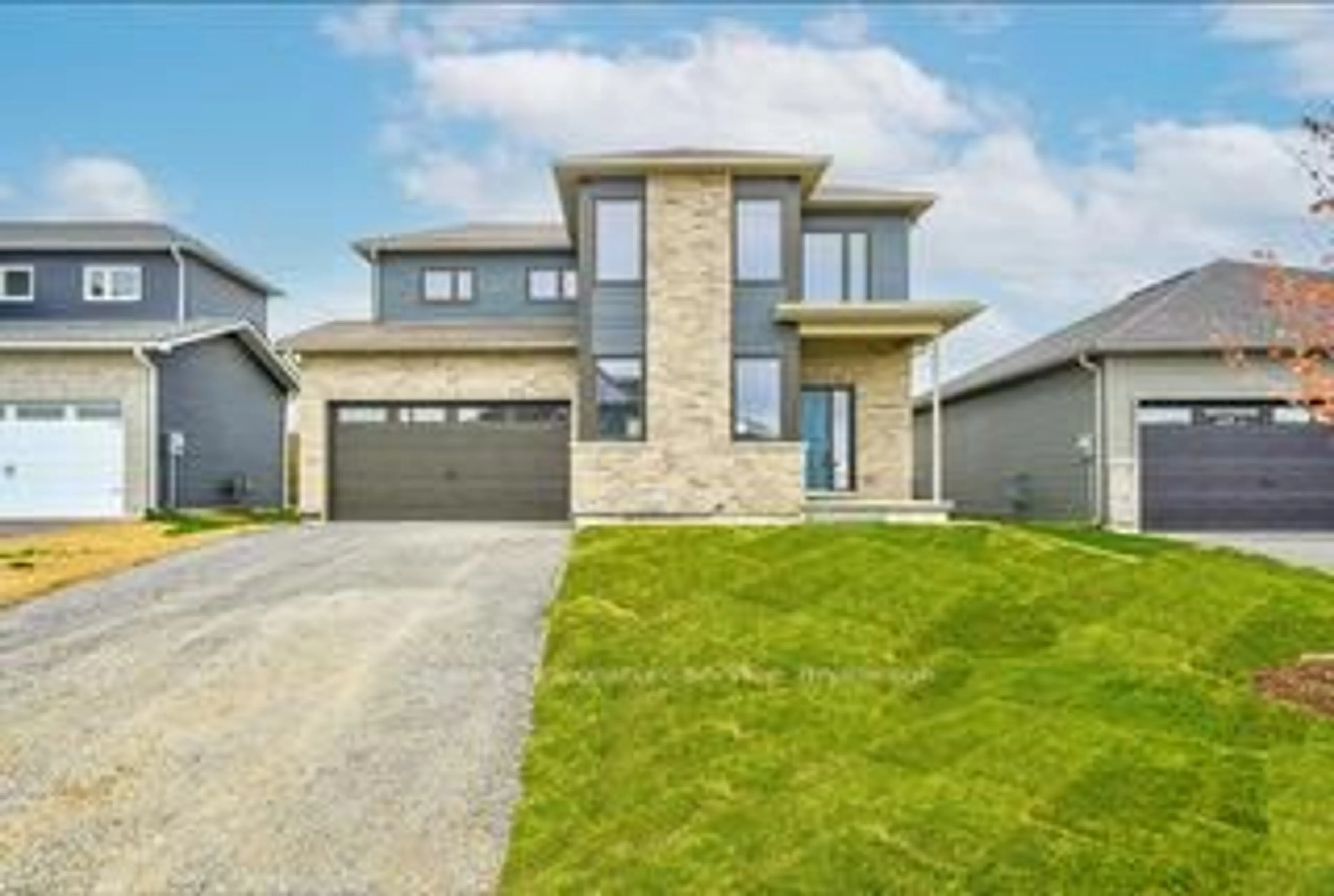 Home with brick exterior material, street for 12 Griffin St, Prince Edward County Ontario K0K 2T0