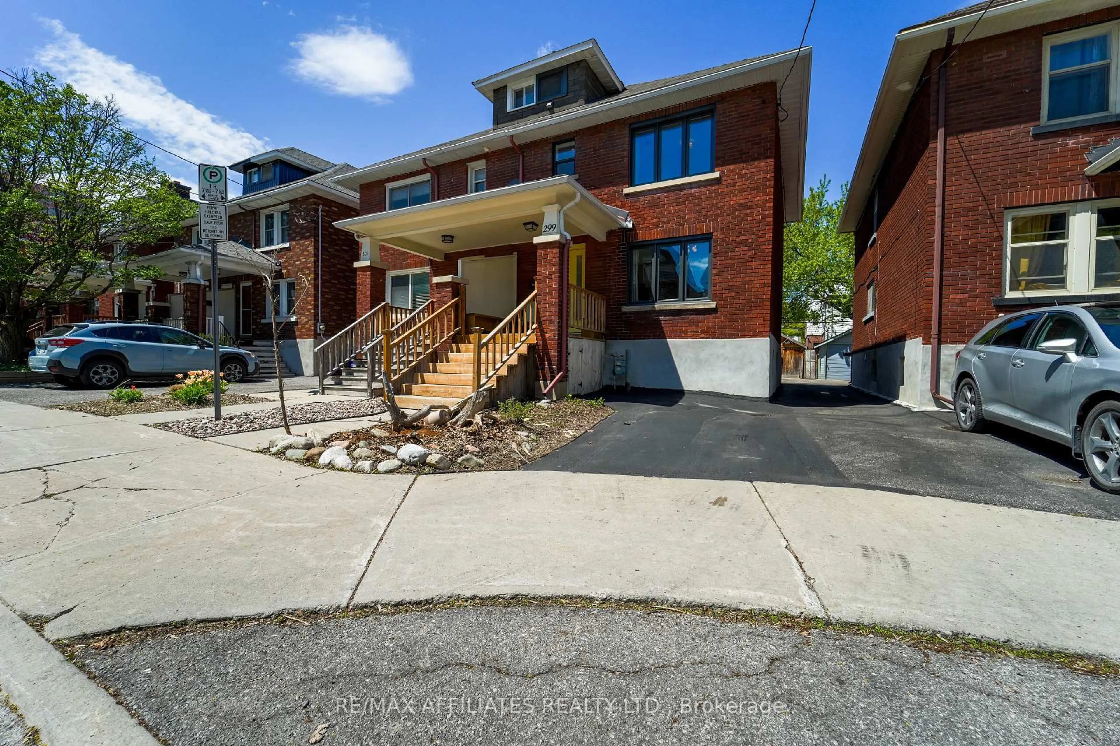Home with brick exterior material, street for 299 Flora St, Ottawa Ontario K1R 5S1