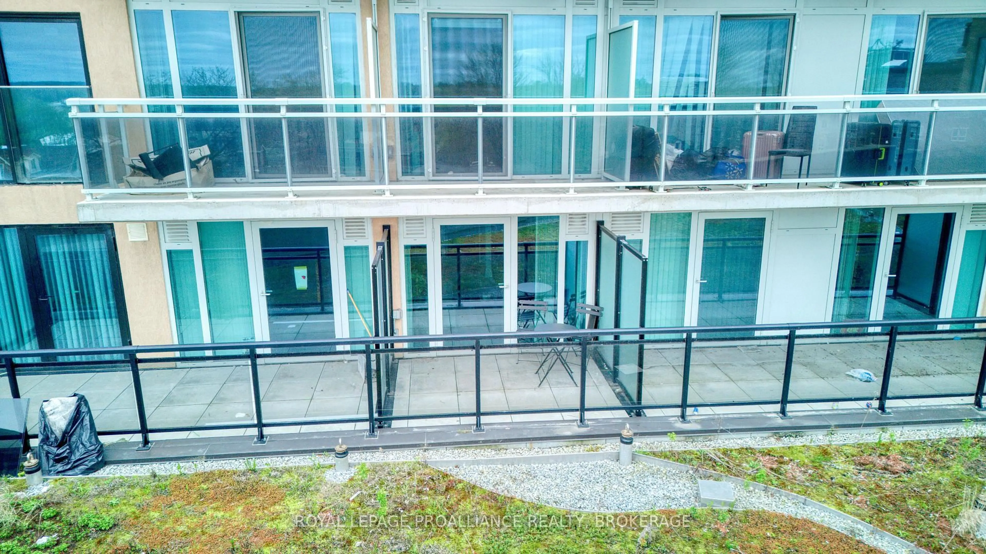 A pic from outside/outdoor area/front of a property/back of a property/a pic from drone, building for 652 Princess St #517, Kingston Ontario K7L 1E5