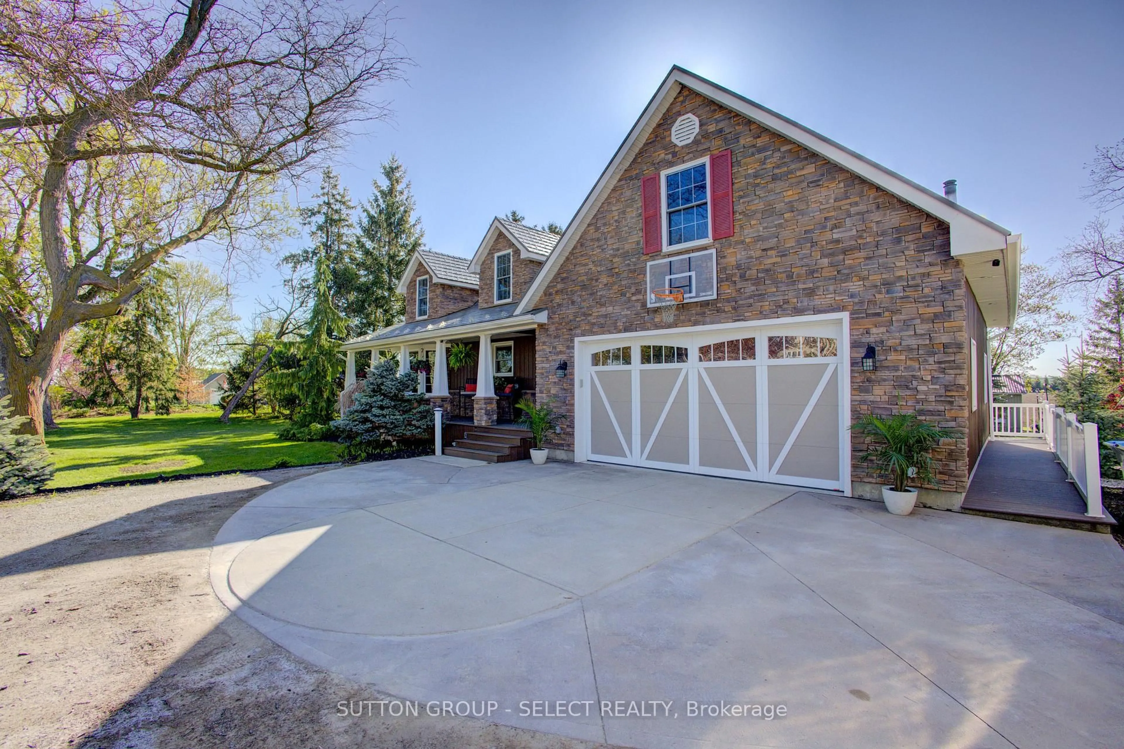Home with brick exterior material, street for 1013 Perth Rd 139 Rd, Perth South Ontario N0M 1V0