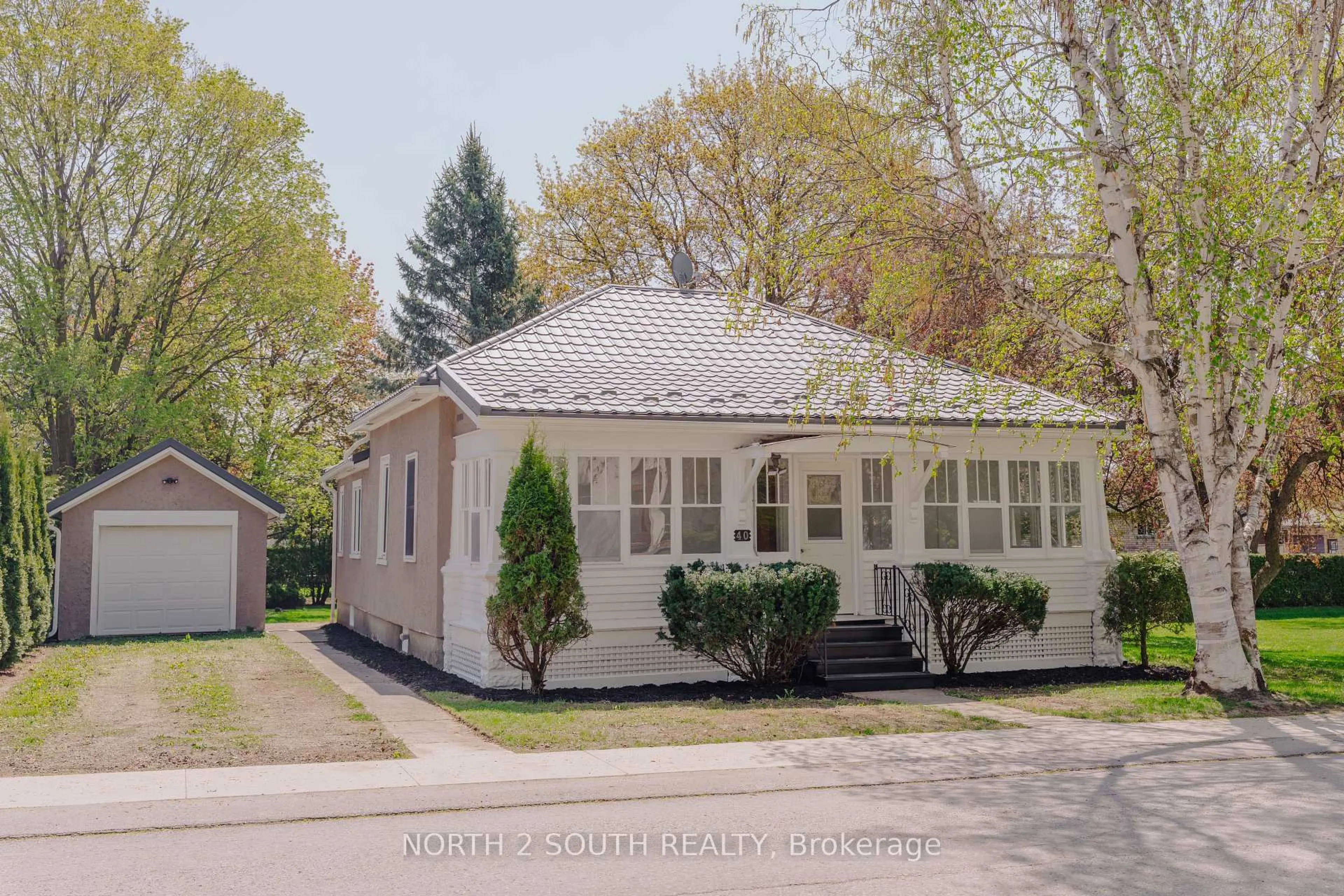 Home with vinyl exterior material, street for 40 Sparling St, Huron East Ontario N0K 1W0