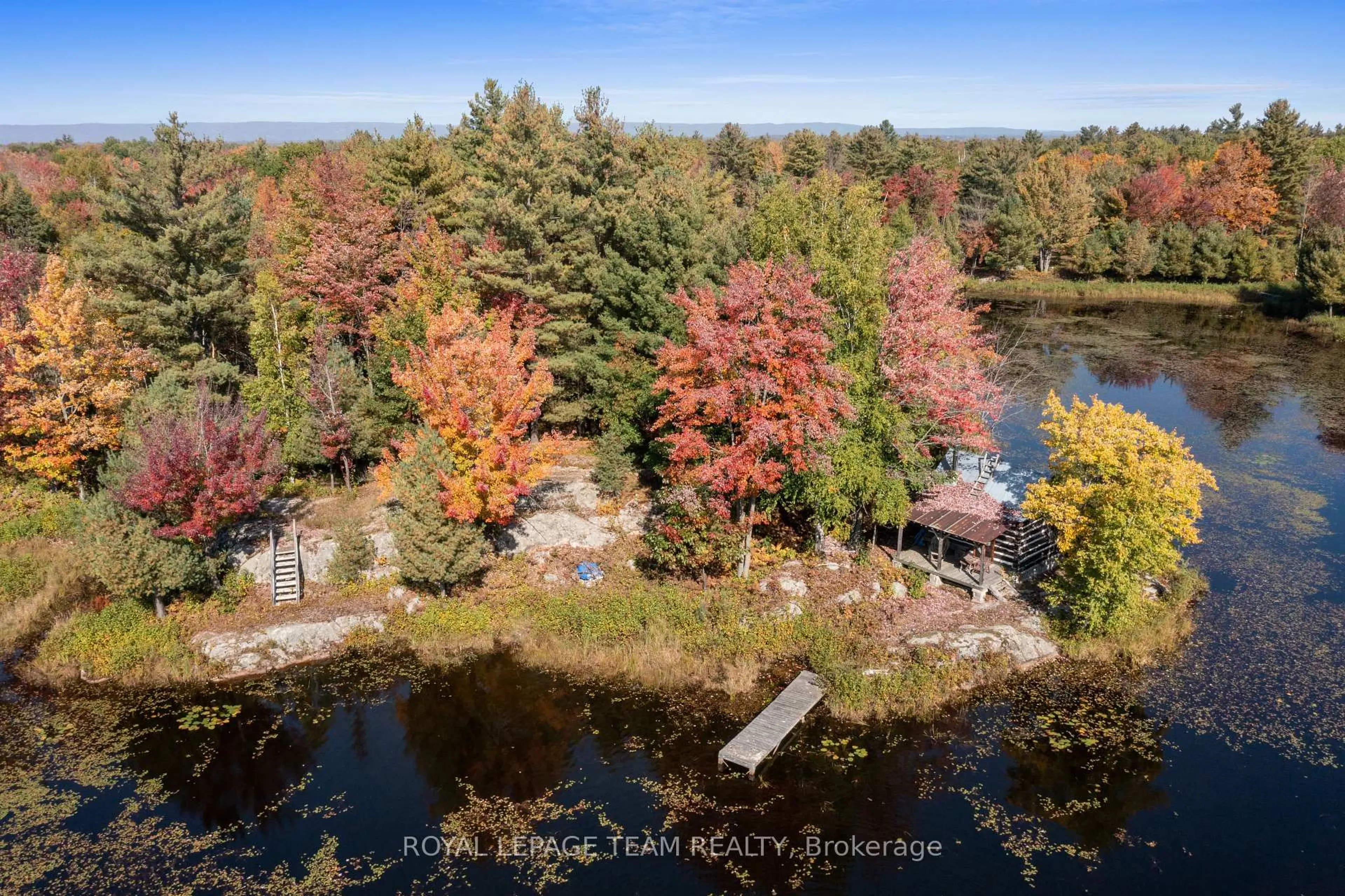A pic from outside/outdoor area/front of a property/back of a property/a pic from drone, water/lake/river/ocean view for 297 John Aselford Driveway Dr, Ottawa Ontario K2W 1A8