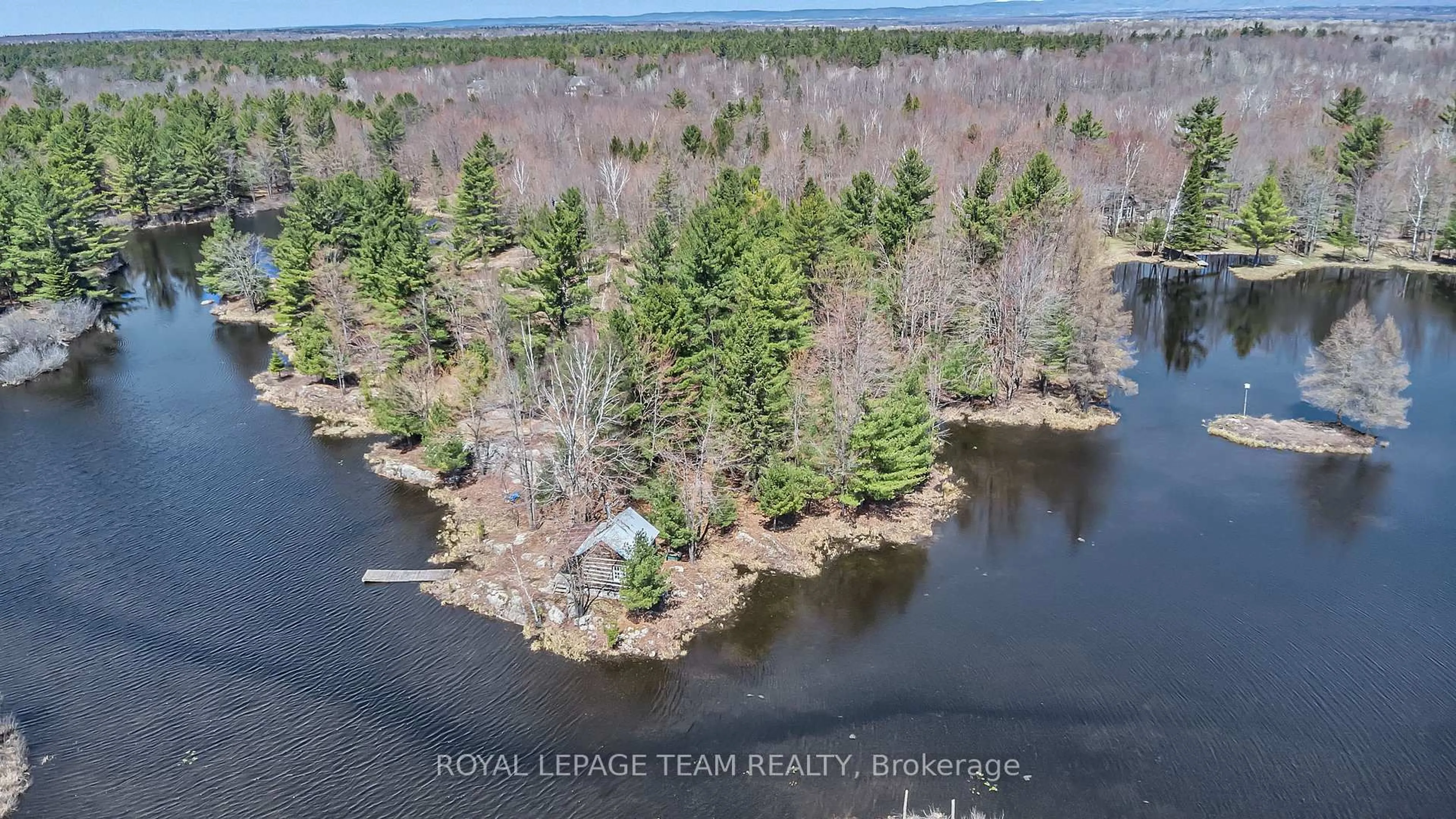 A pic from outside/outdoor area/front of a property/back of a property/a pic from drone, water/lake/river/ocean view for 297 John Aselford Driveway Dr, Ottawa Ontario K2W 1A8
