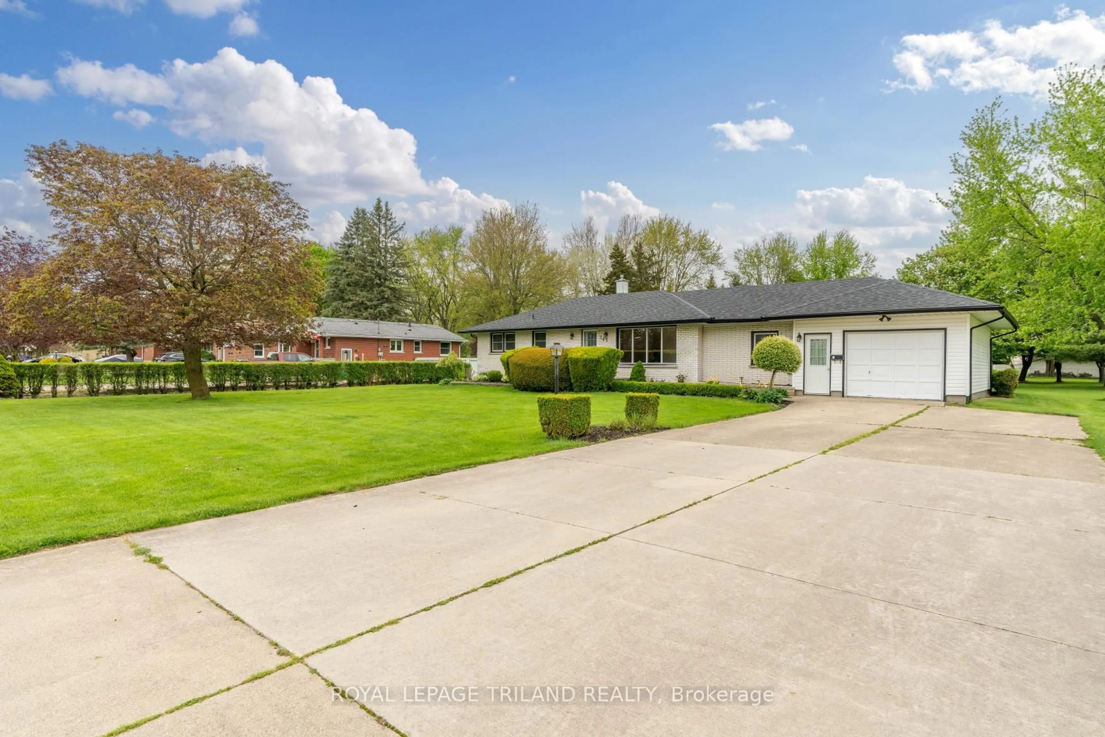 A pic from outside/outdoor area/front of a property/back of a property/a pic from drone, street for 245 Coad St, Southwest Middlesex Ontario N0L 1M0