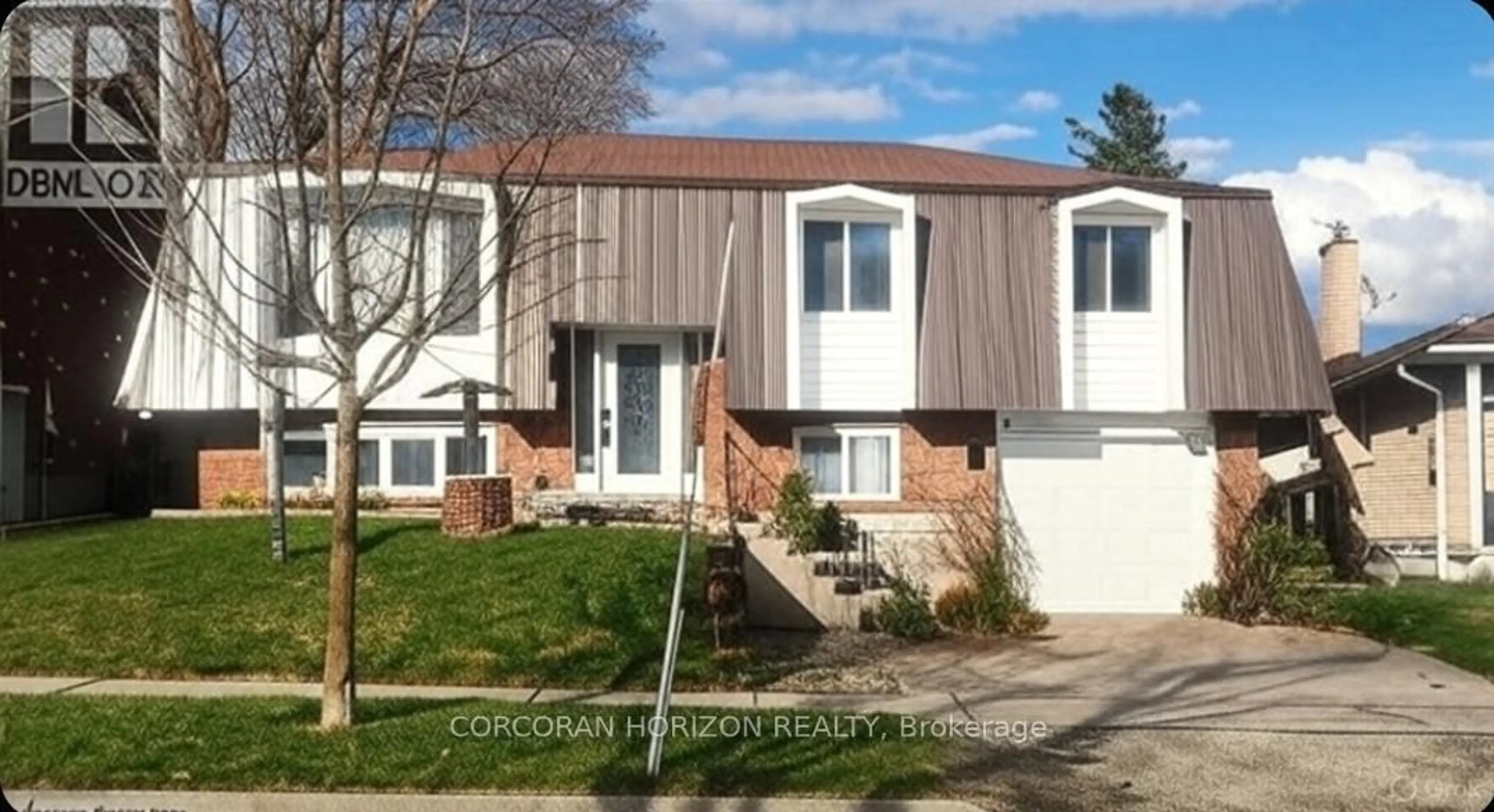 Home with vinyl exterior material, street for 320 Country Hill Dr, Kitchener Ontario N2E 2C2