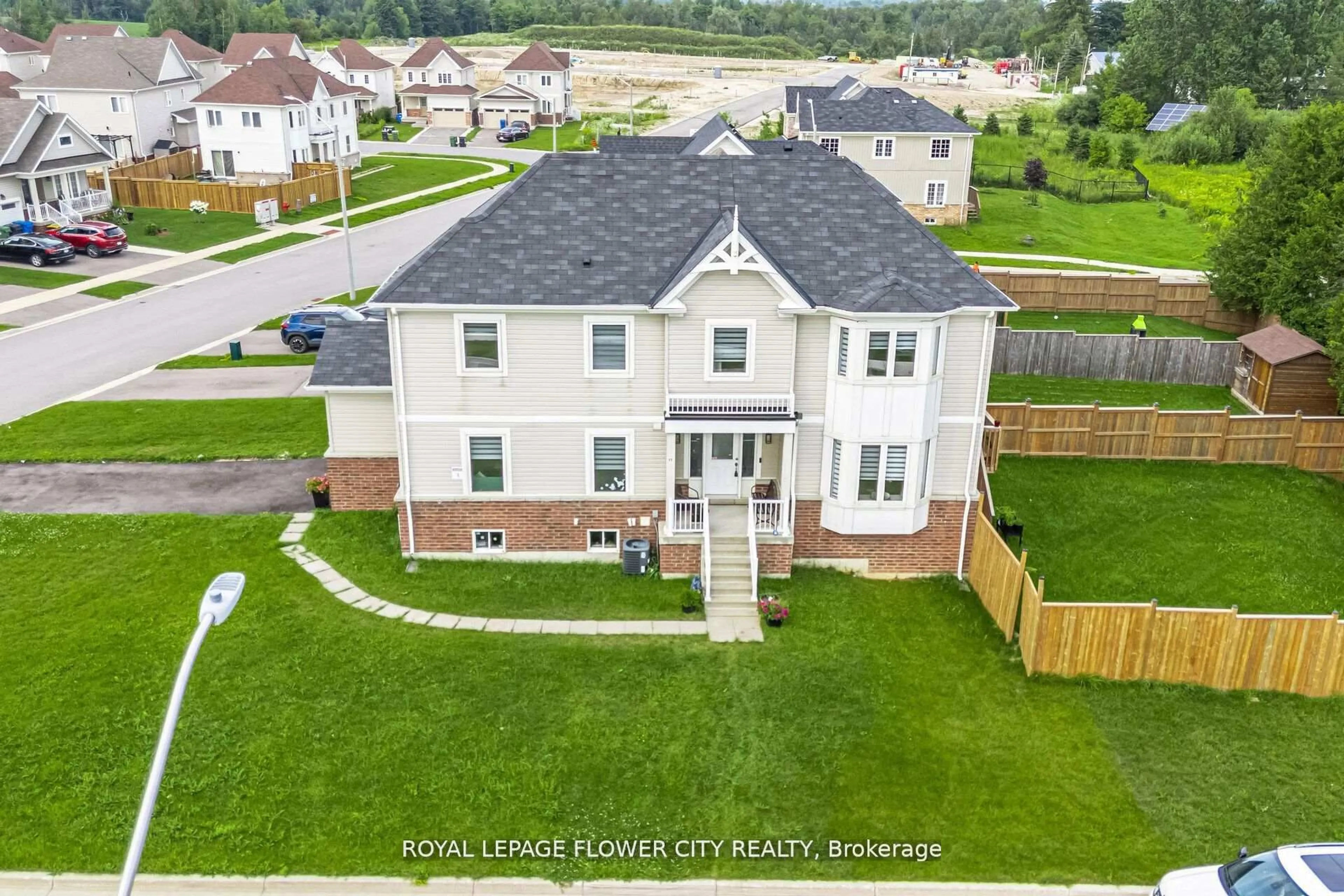 A pic from outside/outdoor area/front of a property/back of a property/a pic from drone, unknown for 89 Todd Cres, Southgate Ontario N0C 1B0