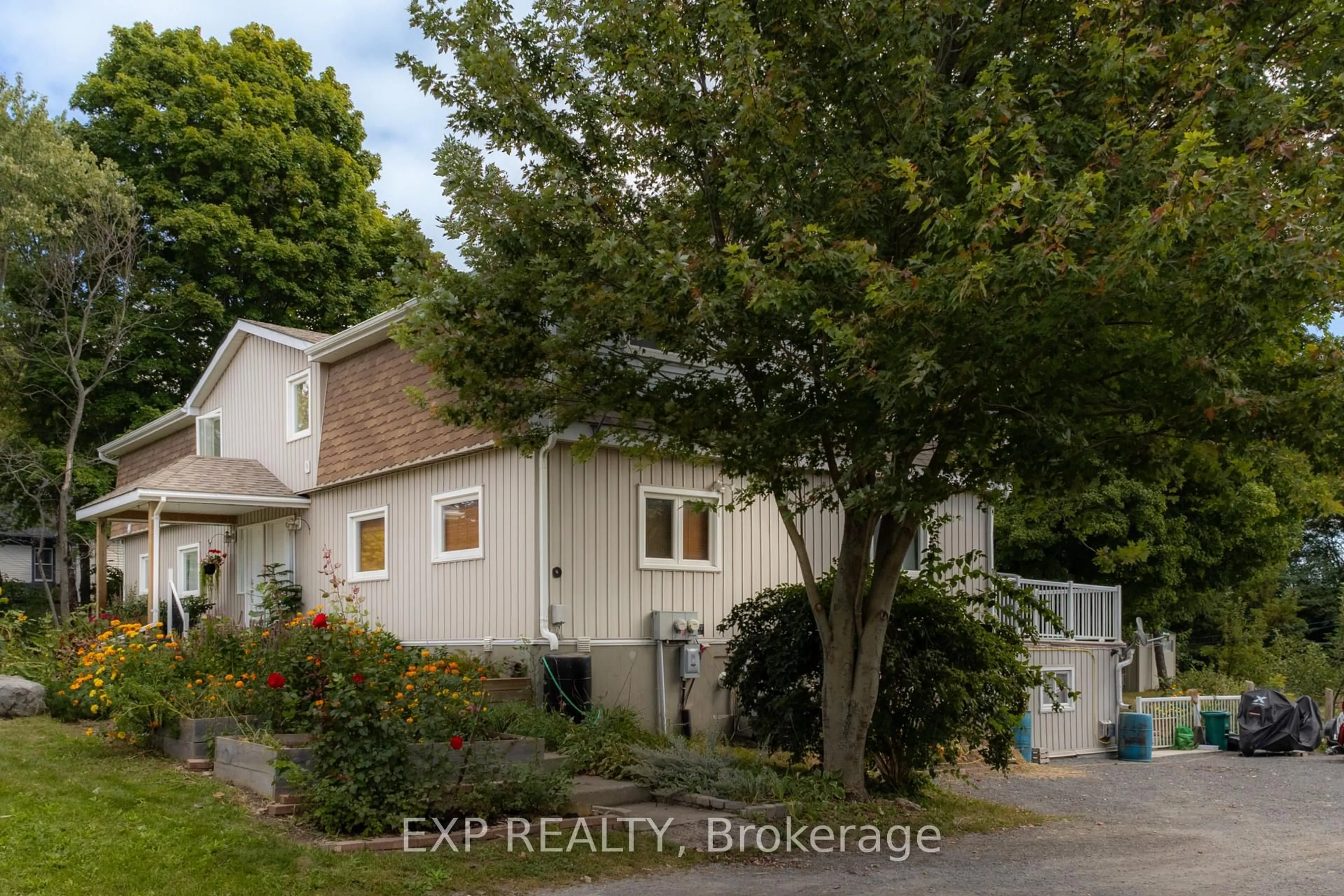 A pic from outside/outdoor area/front of a property/back of a property/a pic from drone, street for 13445 Loyalist Pkwy, Prince Edward County Ontario K0K 2T0