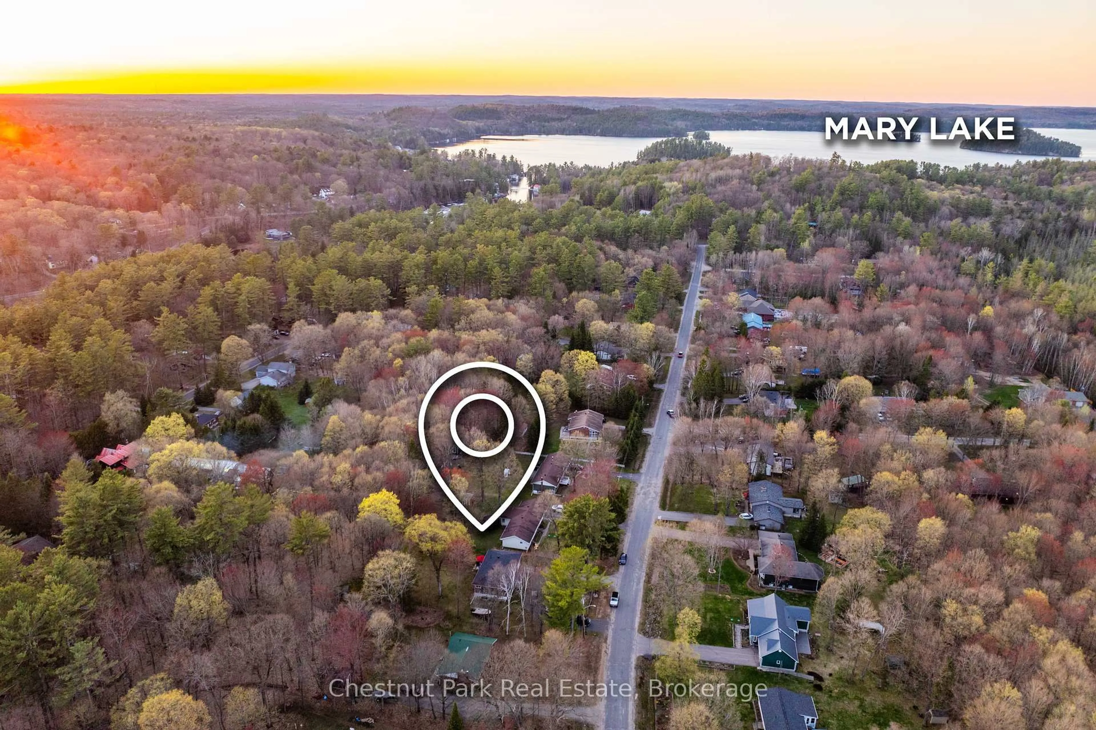 A pic from outside/outdoor area/front of a property/back of a property/a pic from drone, water/lake/river/ocean view for 104 Bridgedale Rd, Huntsville Ontario P0B 1L0