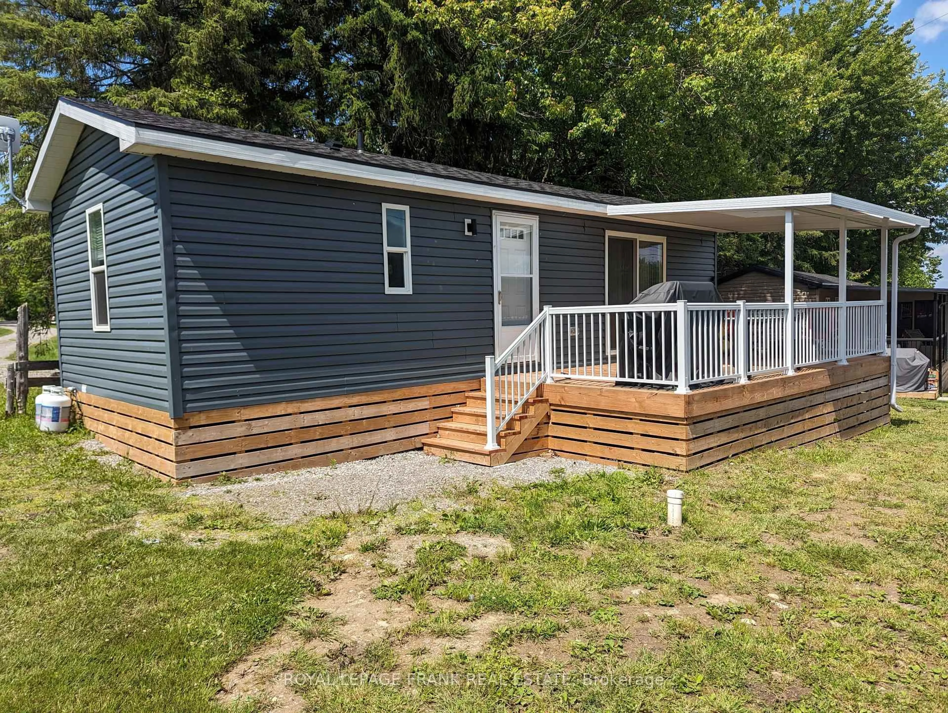 Home with vinyl exterior material, street for 770 Scollard Line #TH015, Selwyn Ontario K0L 1T0