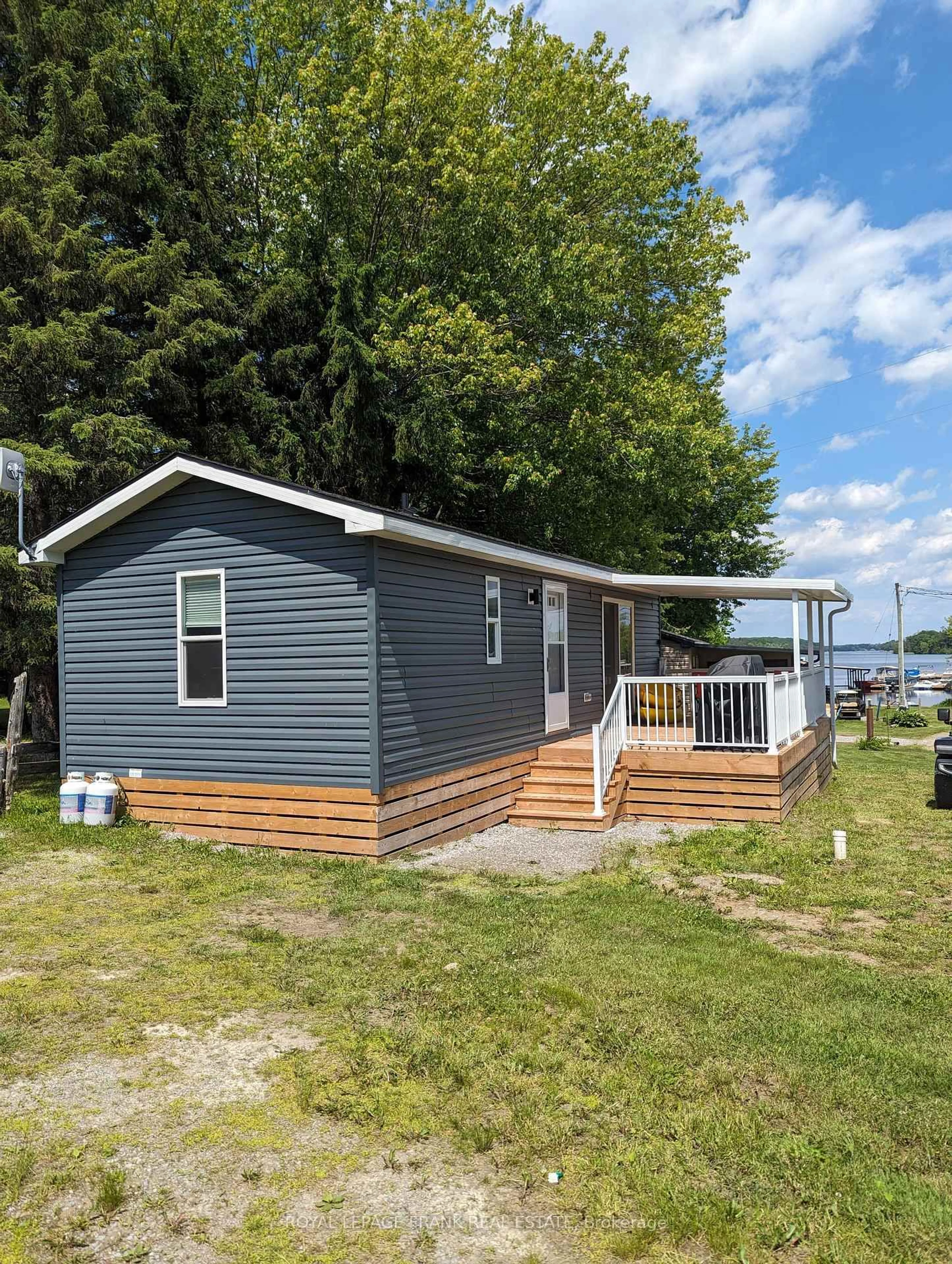 Home with vinyl exterior material, water/lake/river/ocean view for 770 Scollard Line #TH015, Selwyn Ontario K0L 1T0