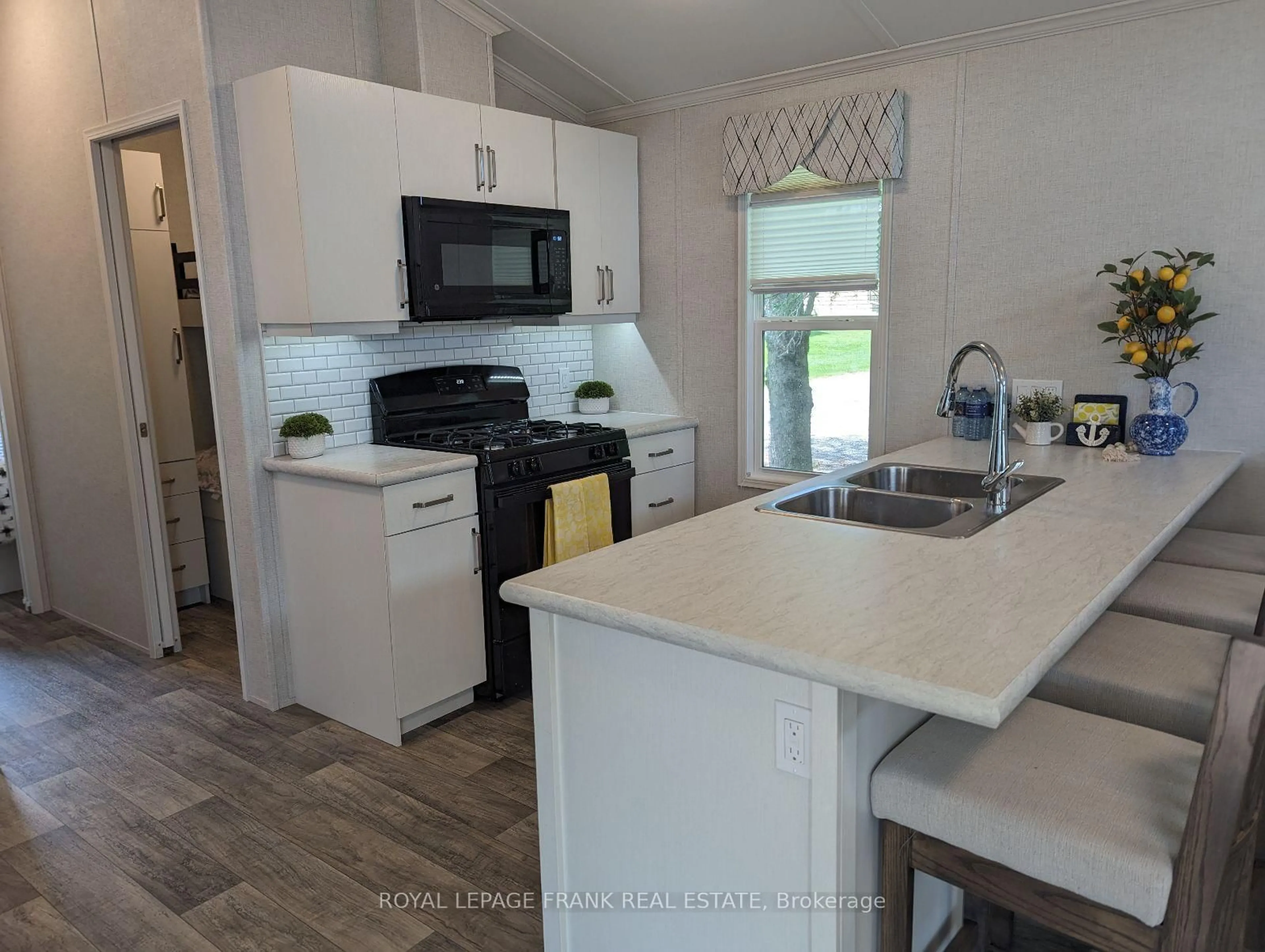 Open concept kitchen, unknown for 770 Scollard Line #TH015, Selwyn Ontario K0L 1T0