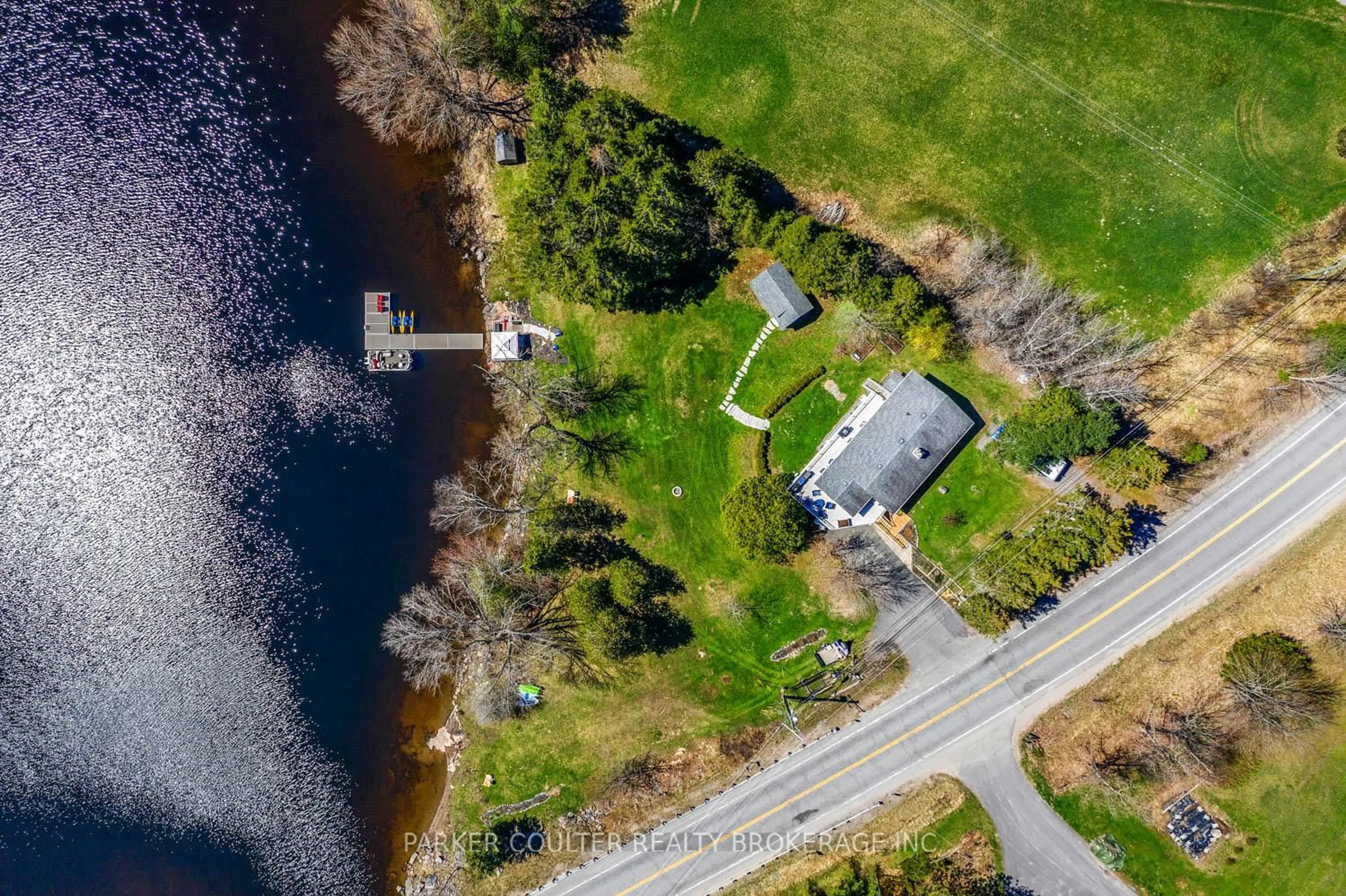 A pic from outside/outdoor area/front of a property/back of a property/a pic from drone, water/lake/river/ocean view for 1091 Hwy 518 N/A, Seguin Ontario P2A 2W9
