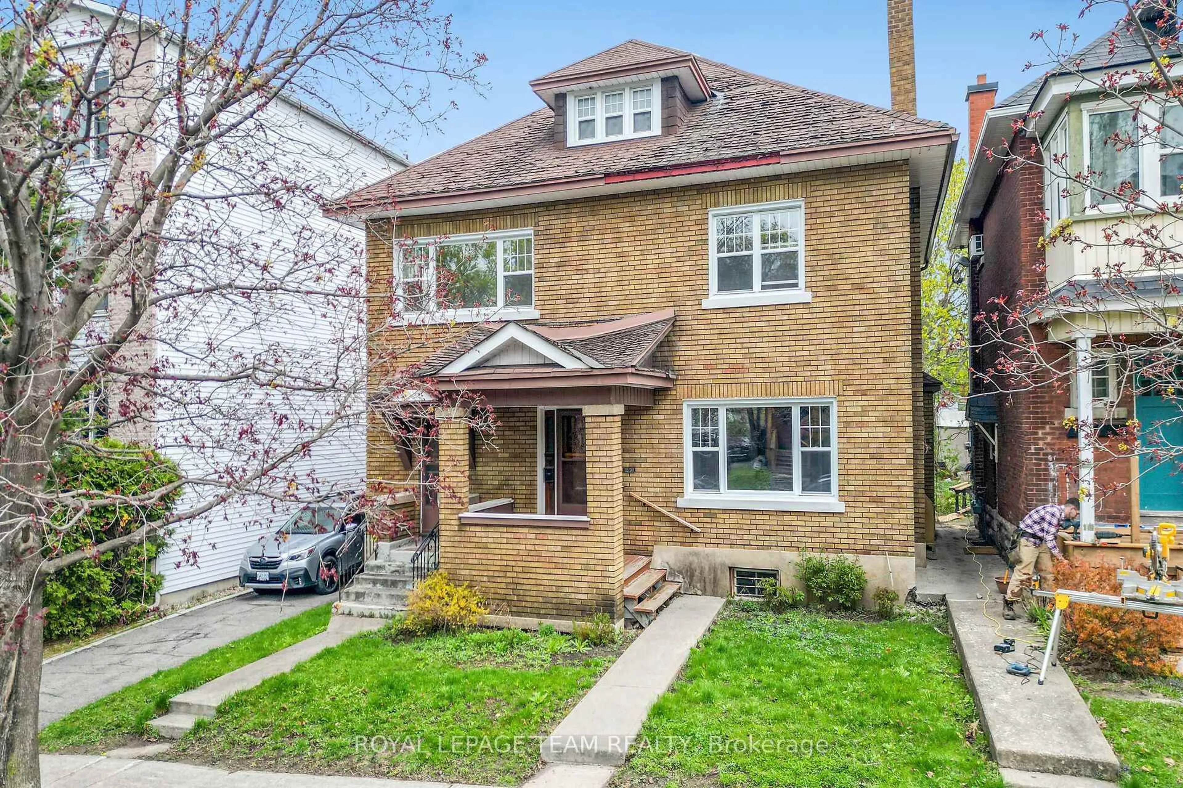 Home with brick exterior material, street for 27 Irving Ave, Ottawa Ontario K1Y 1Z2