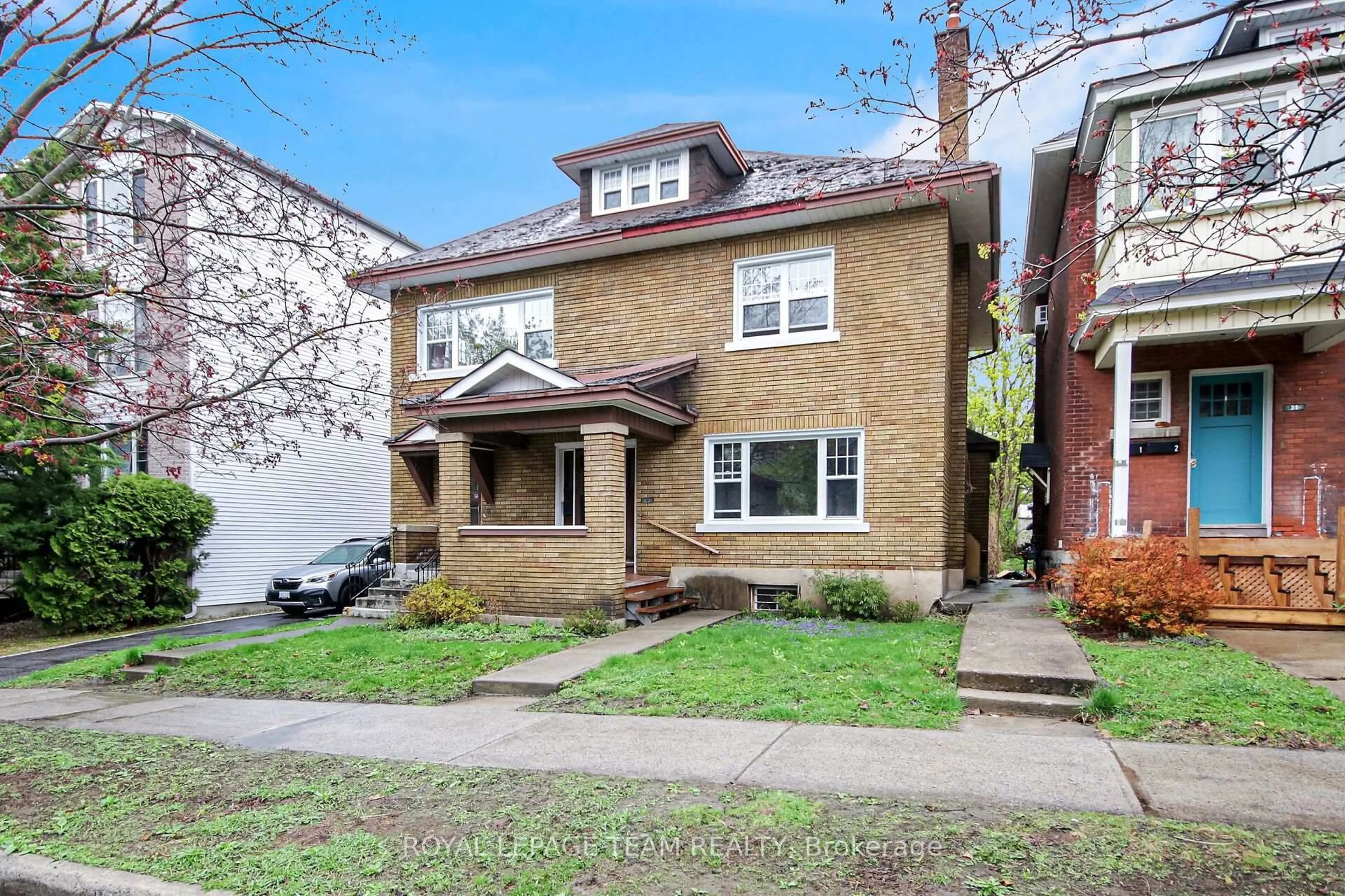 Home with brick exterior material, street for 27 Irving Ave, Ottawa Ontario K1Y 1Z2