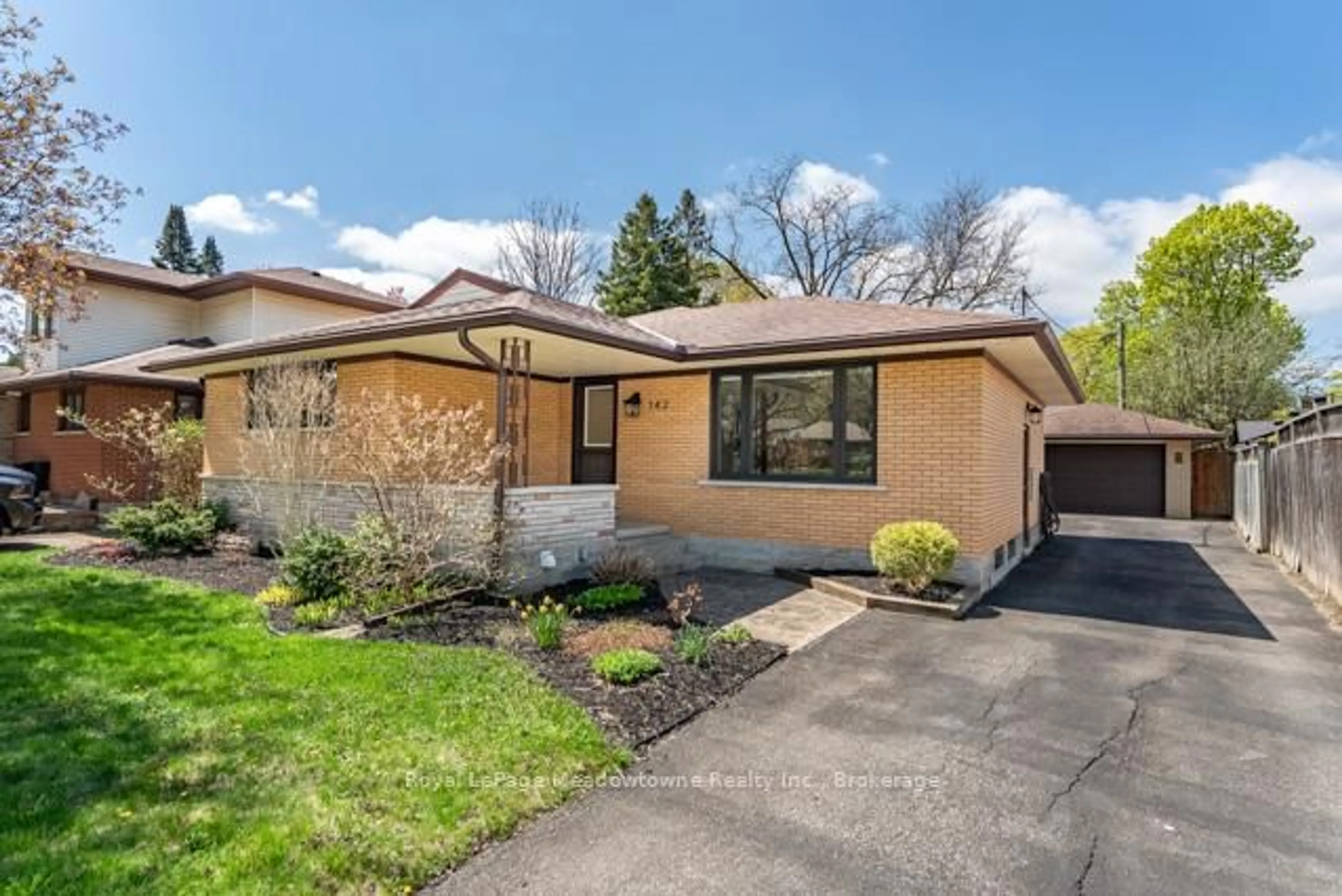 Home with brick exterior material, street for 142 Mackay Cres, Waterloo Ontario N2J 3K3
