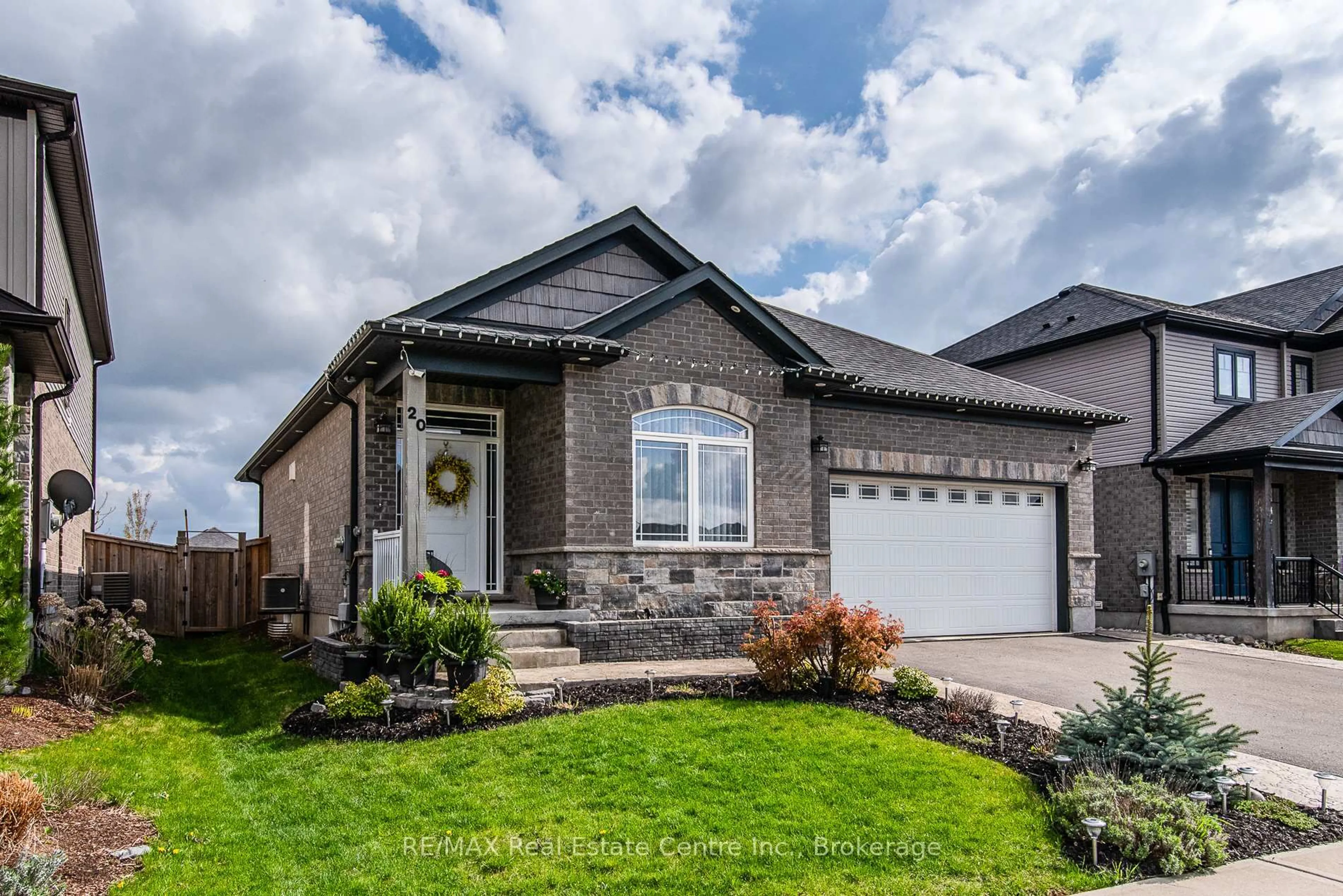 Home with brick exterior material, street for 20 Stier Rd, Wilmot Ontario N3A 4N7