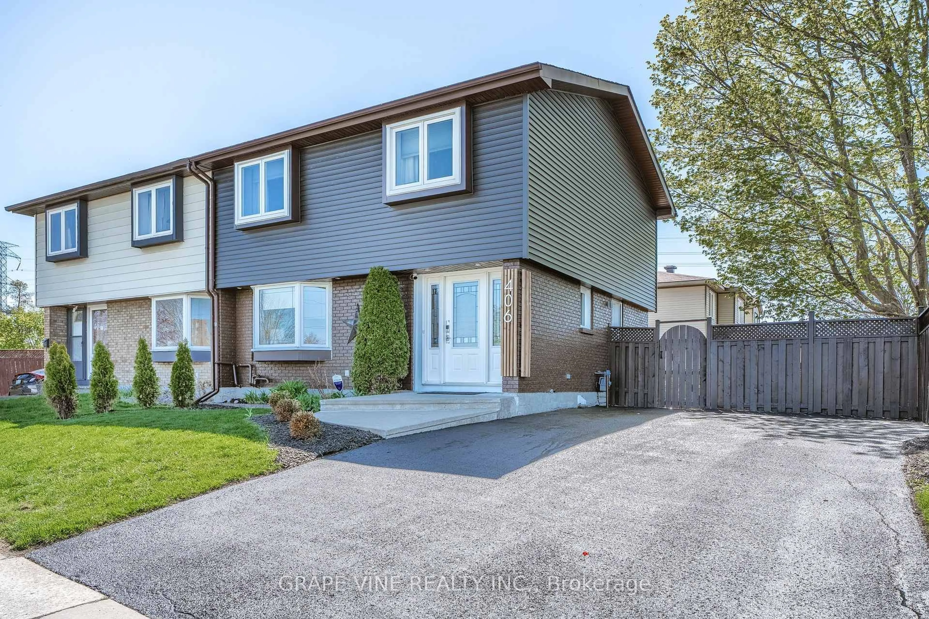 Home with vinyl exterior material, street for 406 Woodfield Dr, Ottawa Ontario K2G 3W9