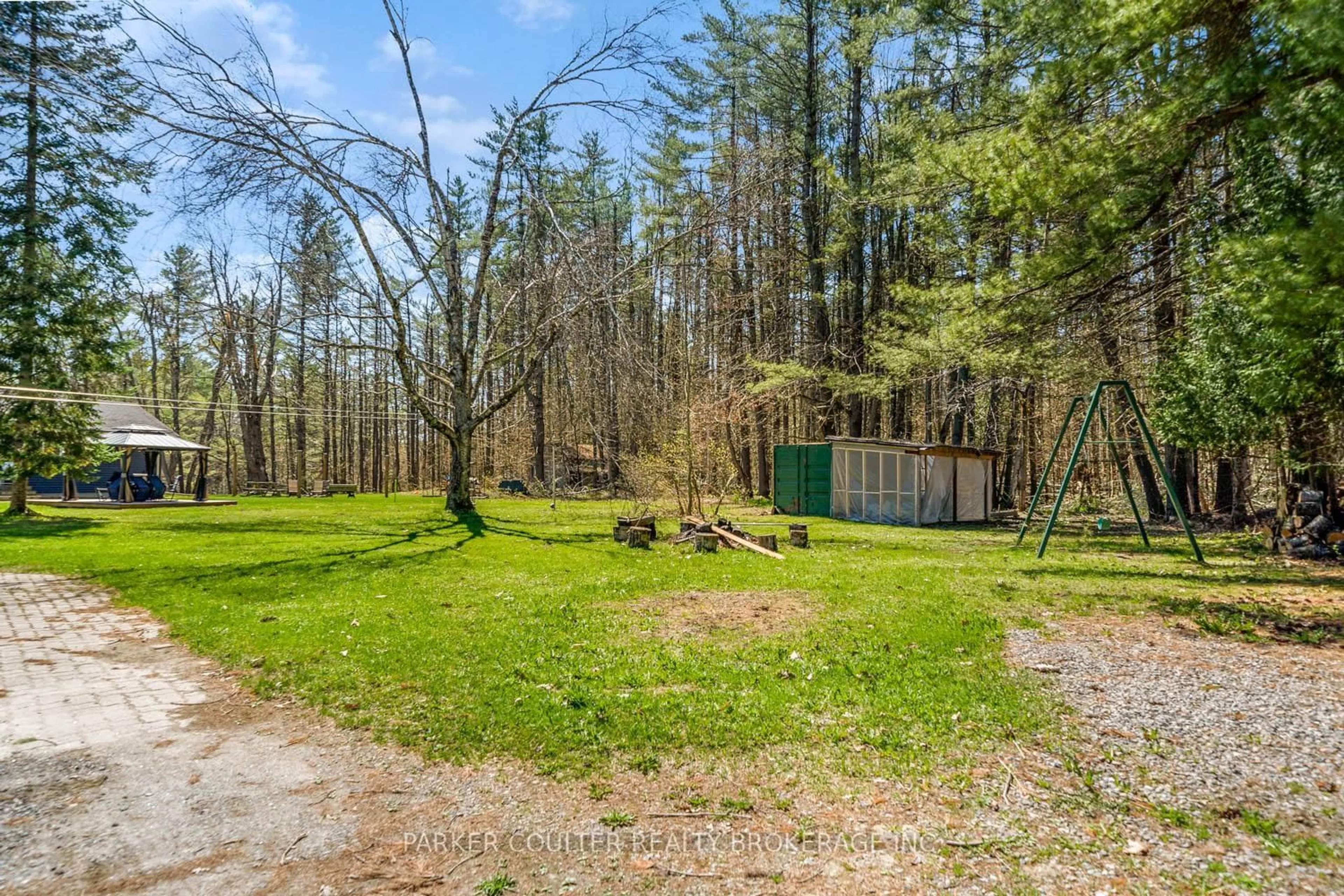 A pic from outside/outdoor area/front of a property/back of a property/a pic from drone, forest/trees view for 78 Hugh Campbell Dr, Bracebridge Ontario P1L 0A1
