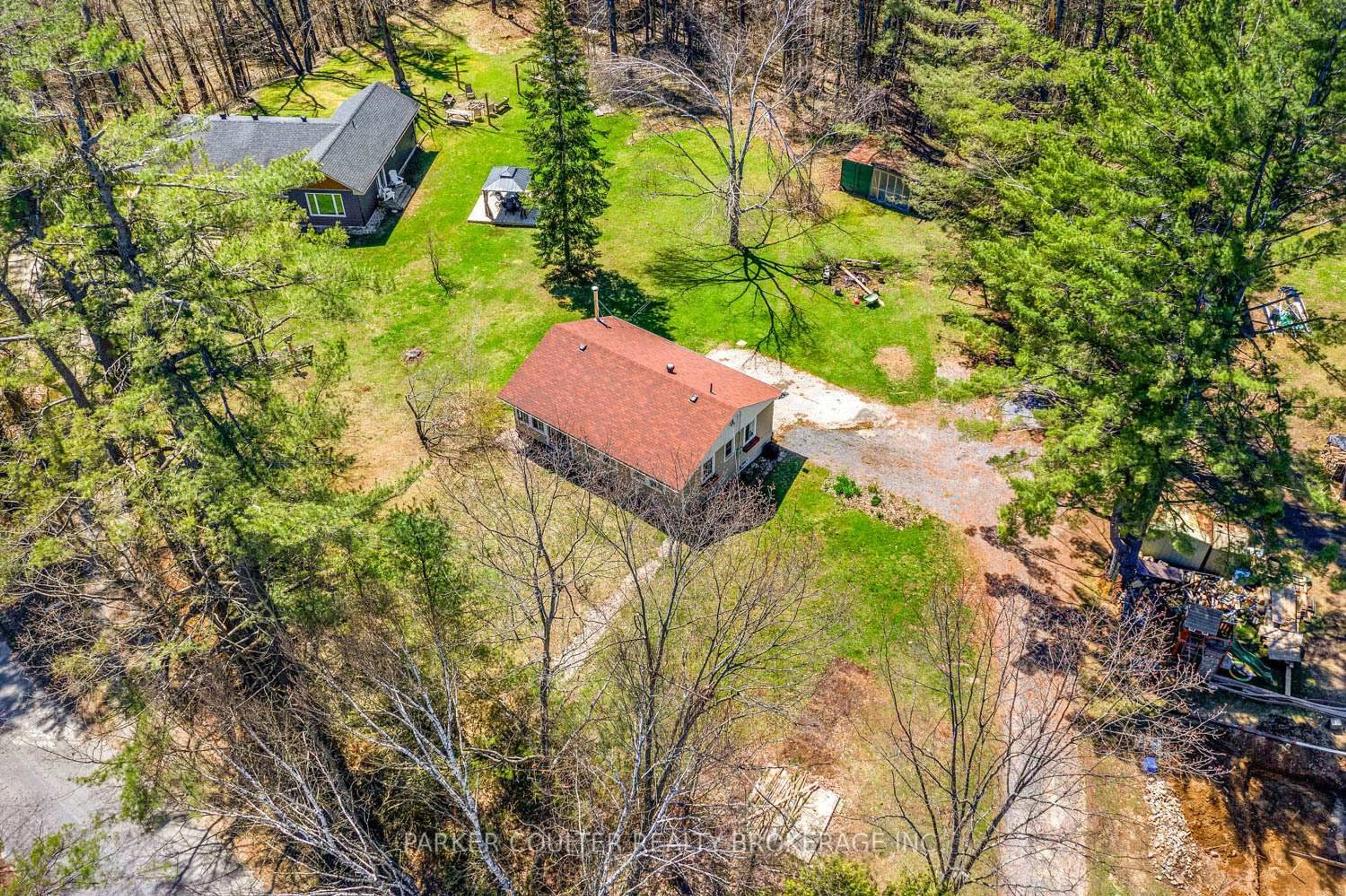A pic from outside/outdoor area/front of a property/back of a property/a pic from drone, forest/trees view for 78 Hugh Campbell Dr, Bracebridge Ontario P1L 0A1