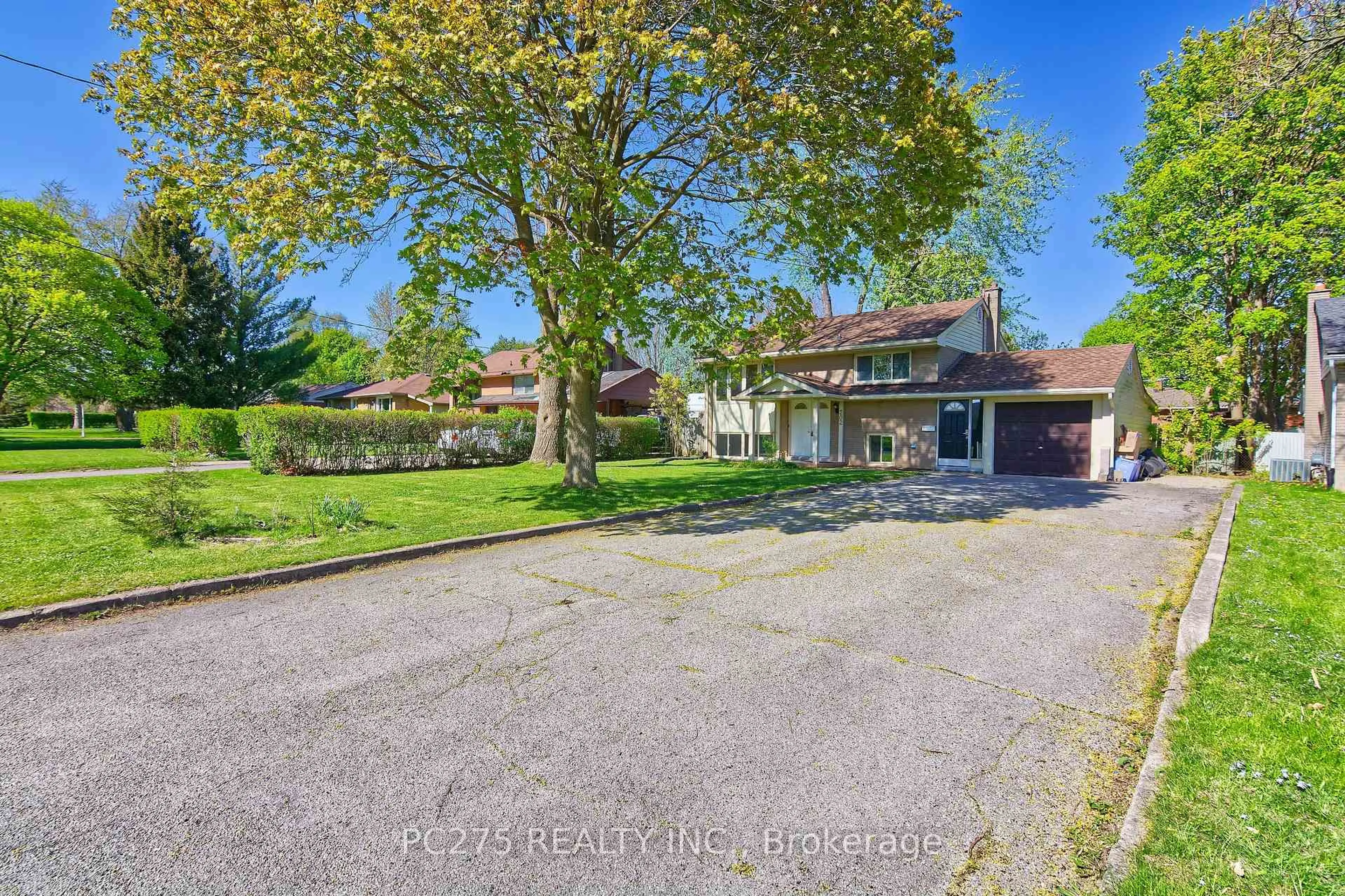 A pic from outside/outdoor area/front of a property/back of a property/a pic from drone, street for 202 Michaelmas St, London East Ontario N5Y 1N1
