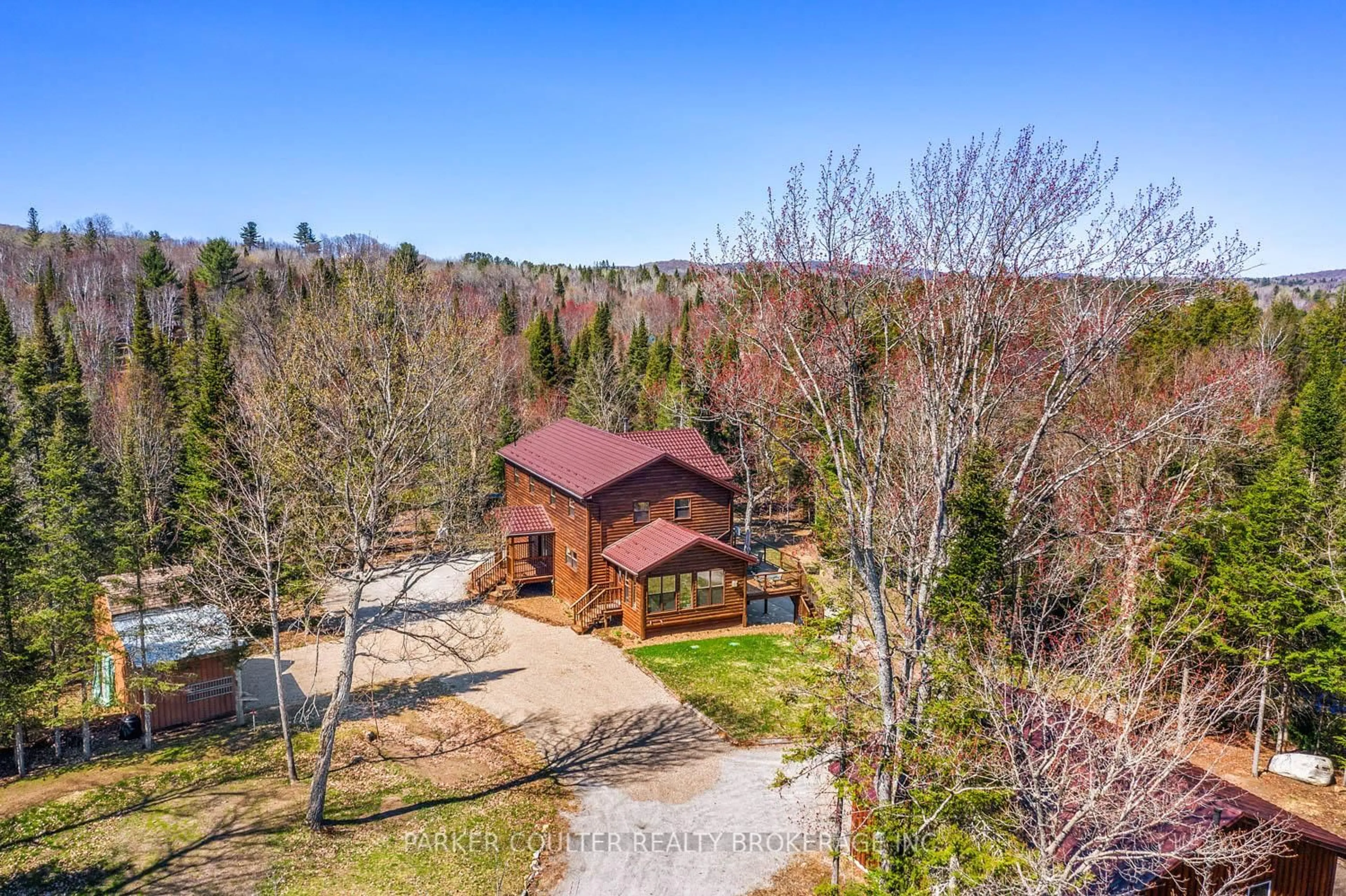 A pic from outside/outdoor area/front of a property/back of a property/a pic from drone, unknown for 390 Pinegrove Rd, Perry Ontario P0A 1J0
