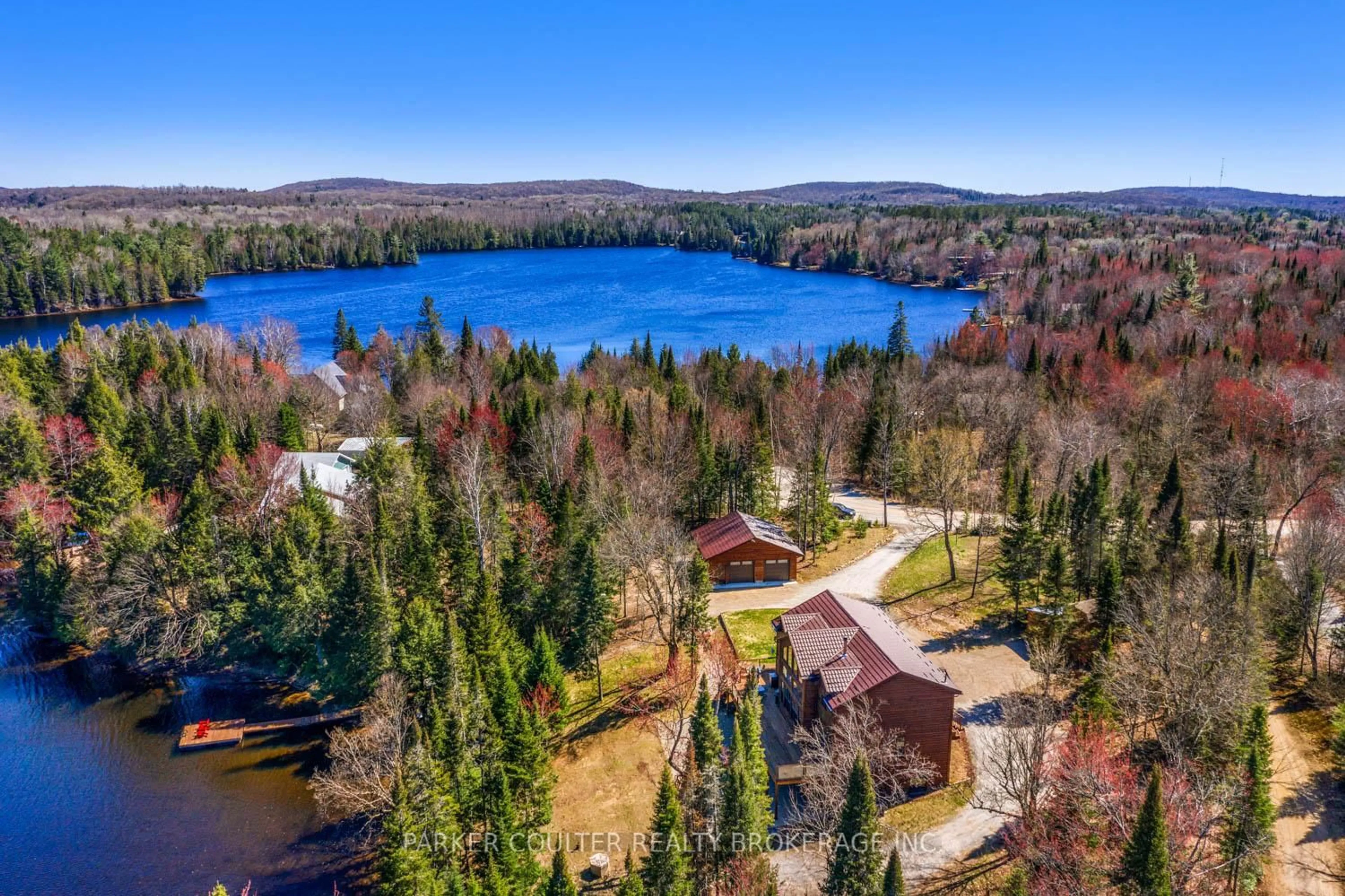A pic from outside/outdoor area/front of a property/back of a property/a pic from drone, water/lake/river/ocean view for 390 Pinegrove Rd, Perry Ontario P0A 1J0