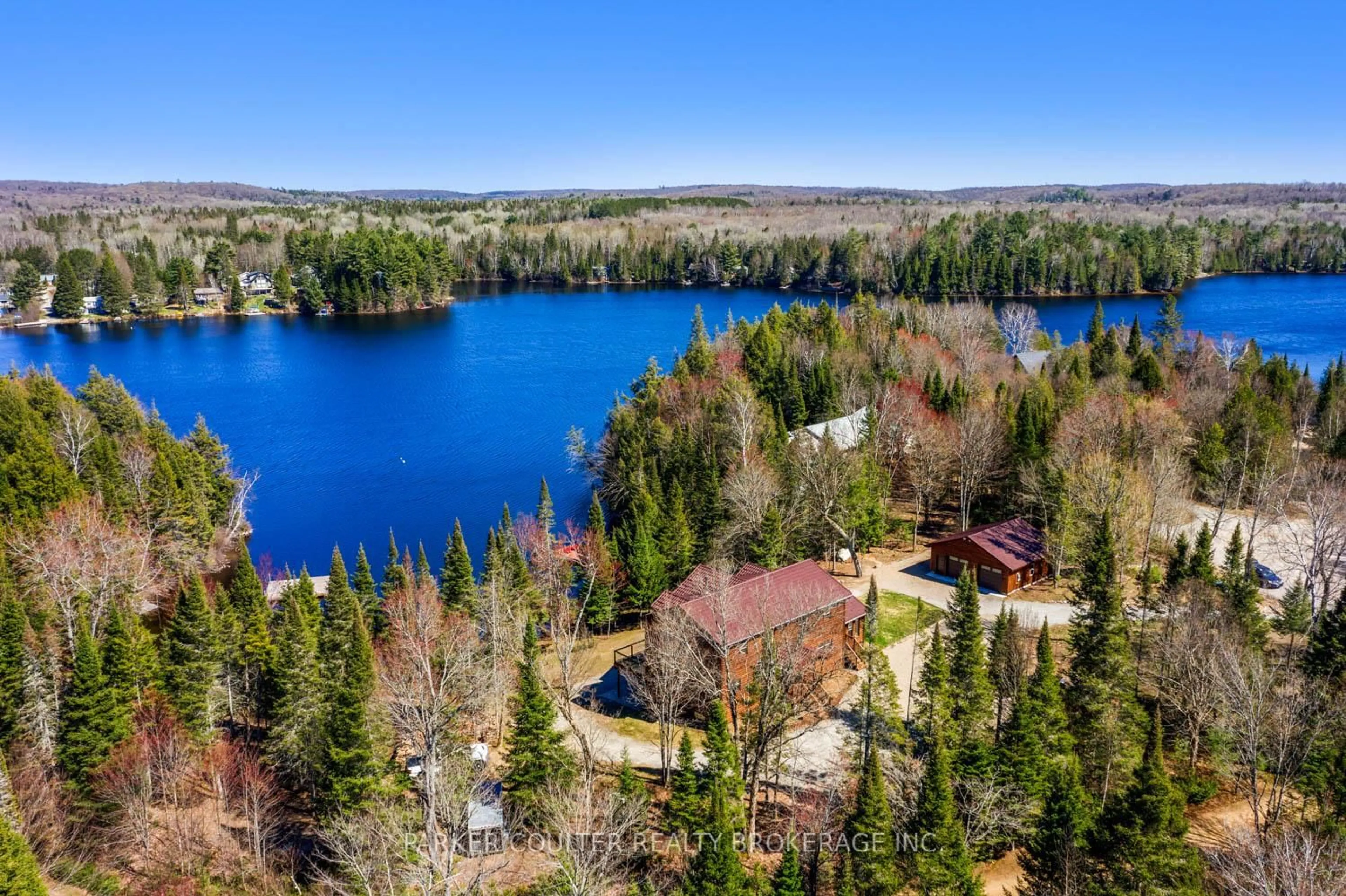 A pic from outside/outdoor area/front of a property/back of a property/a pic from drone, water/lake/river/ocean view for 390 Pinegrove Rd, Perry Ontario P0A 1J0