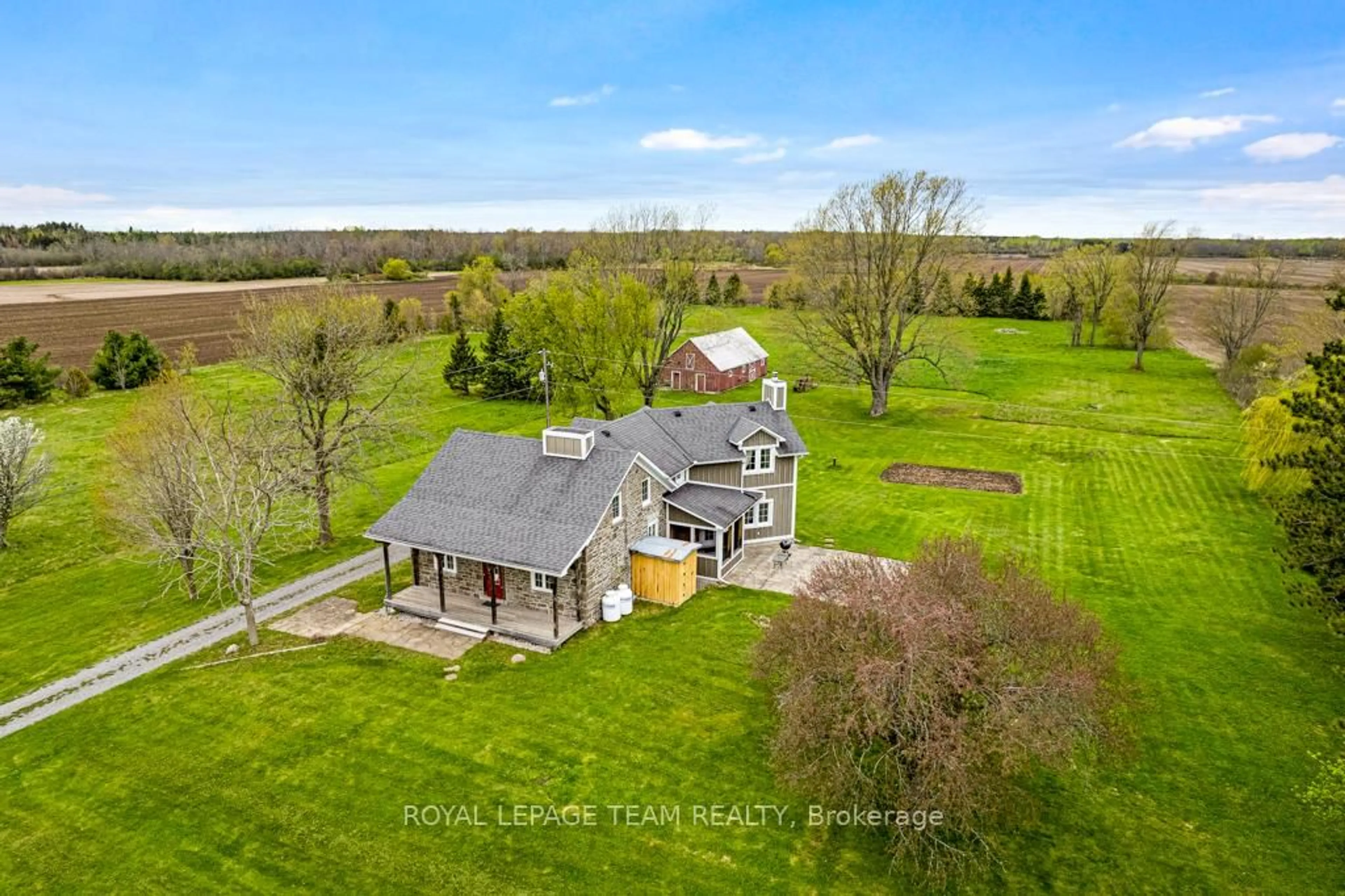 A pic from outside/outdoor area/front of a property/back of a property/a pic from drone, water/lake/river/ocean view for 1285 Craig Rd, North Grenville Ontario K0G 1S0