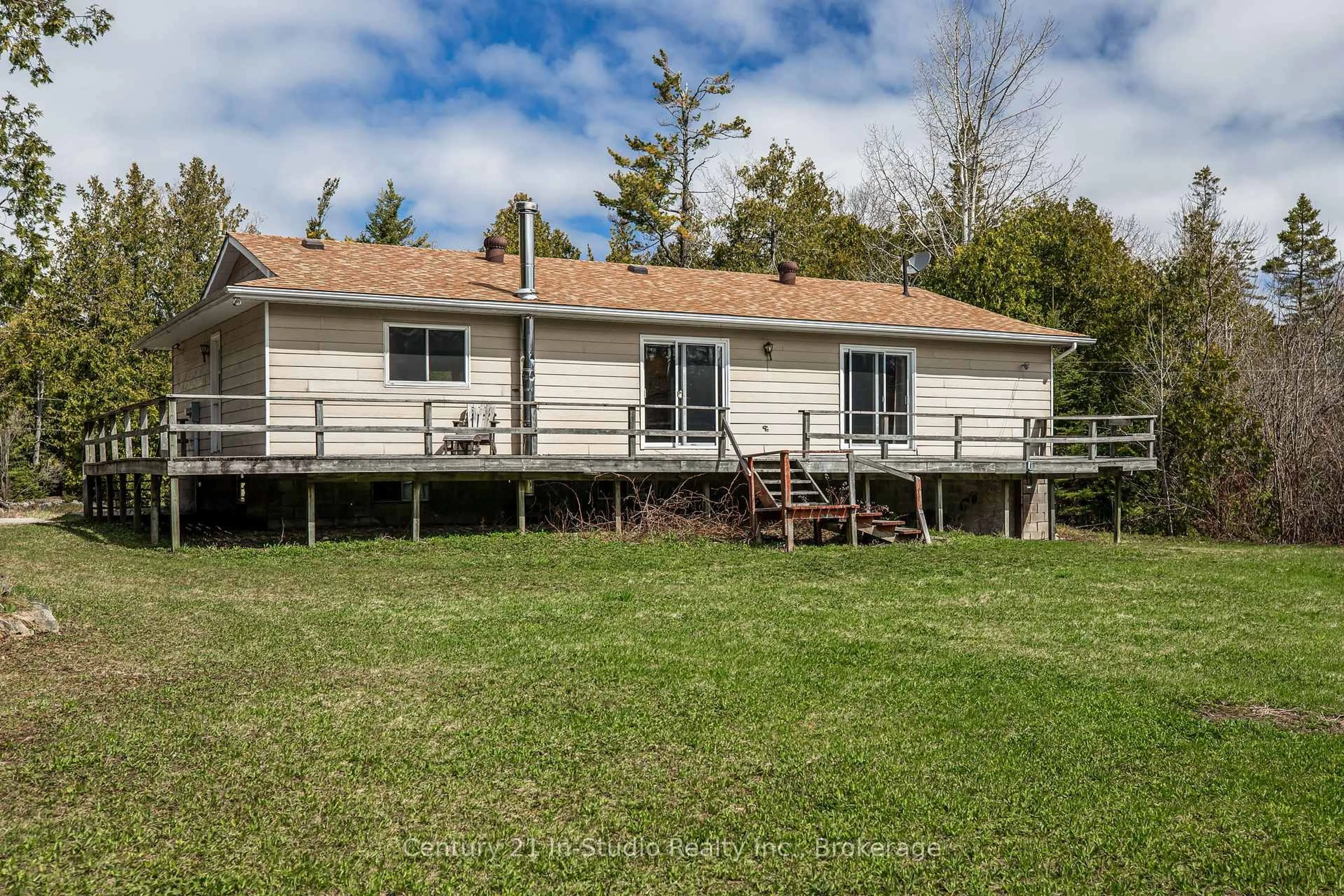 A pic from outside/outdoor area/front of a property/back of a property/a pic from drone, water/lake/river/ocean view for 12 Nicholas St, Northern Bruce Peninsula Ontario N0G 2R0