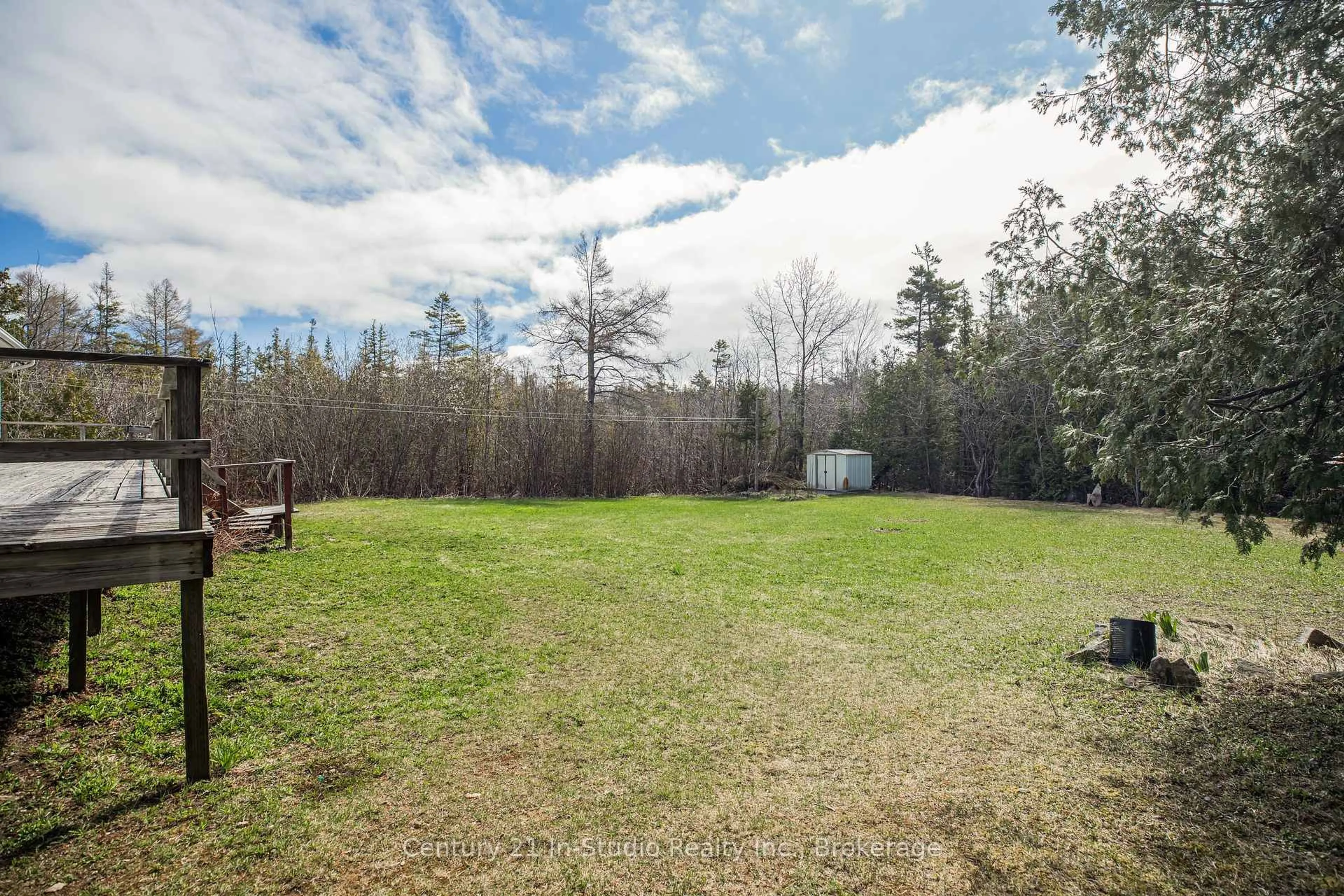A pic from outside/outdoor area/front of a property/back of a property/a pic from drone, forest/trees view for 12 Nicholas St, Northern Bruce Peninsula Ontario N0G 2R0
