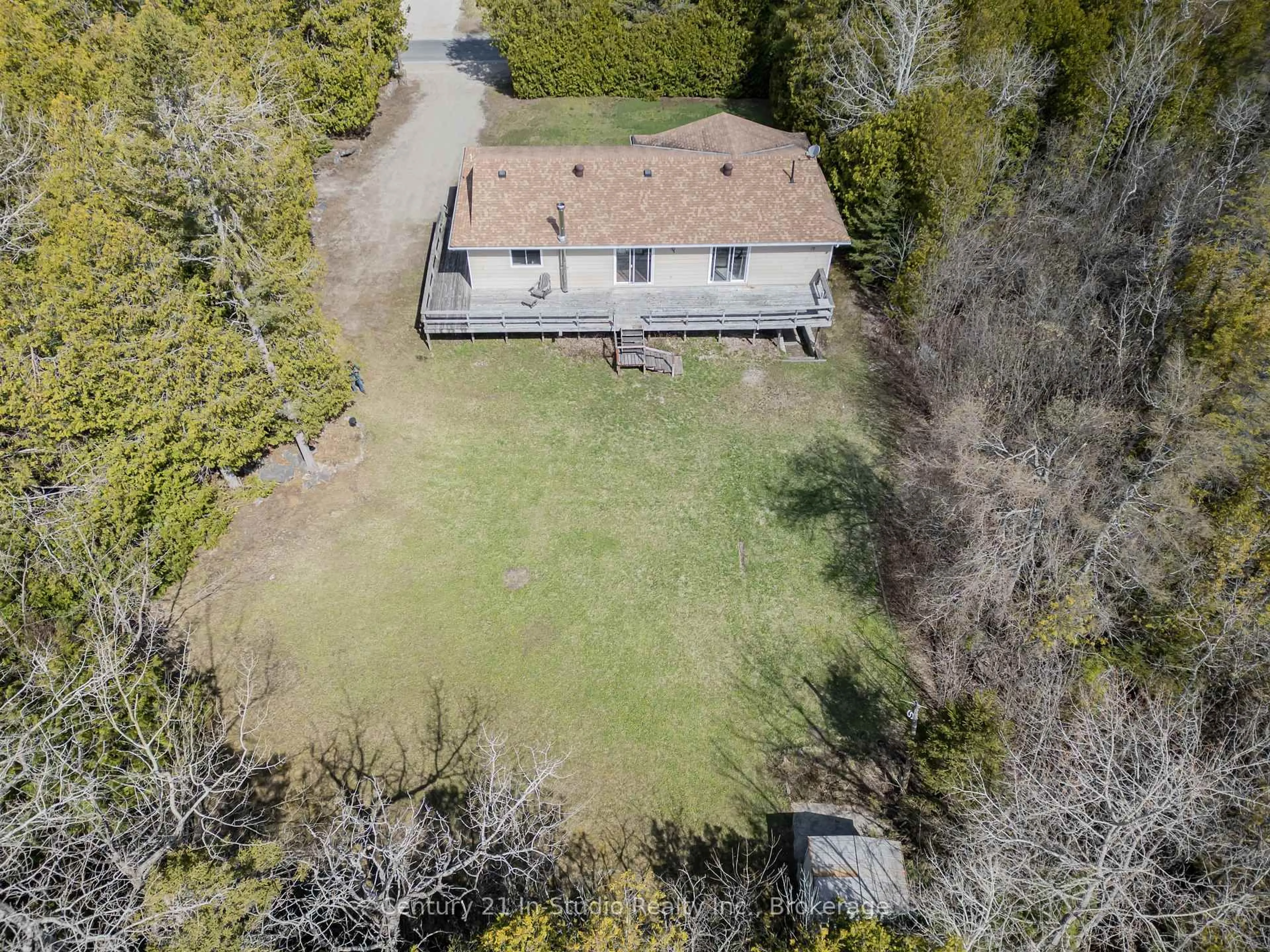 A pic from outside/outdoor area/front of a property/back of a property/a pic from drone, street for 12 Nicholas St, Northern Bruce Peninsula Ontario N0G 2R0