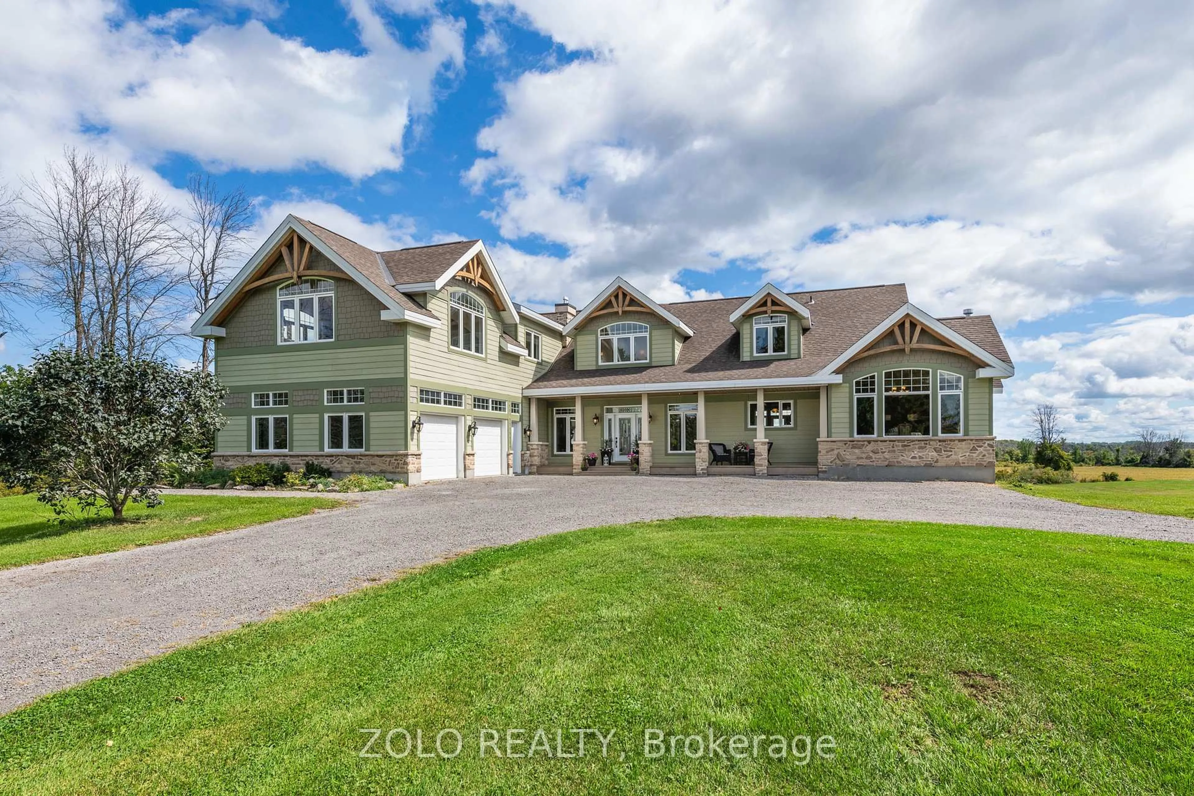 A pic from outside/outdoor area/front of a property/back of a property/a pic from drone, water/lake/river/ocean view for 2659 River Rd, Ottawa Ontario K4M 1B4