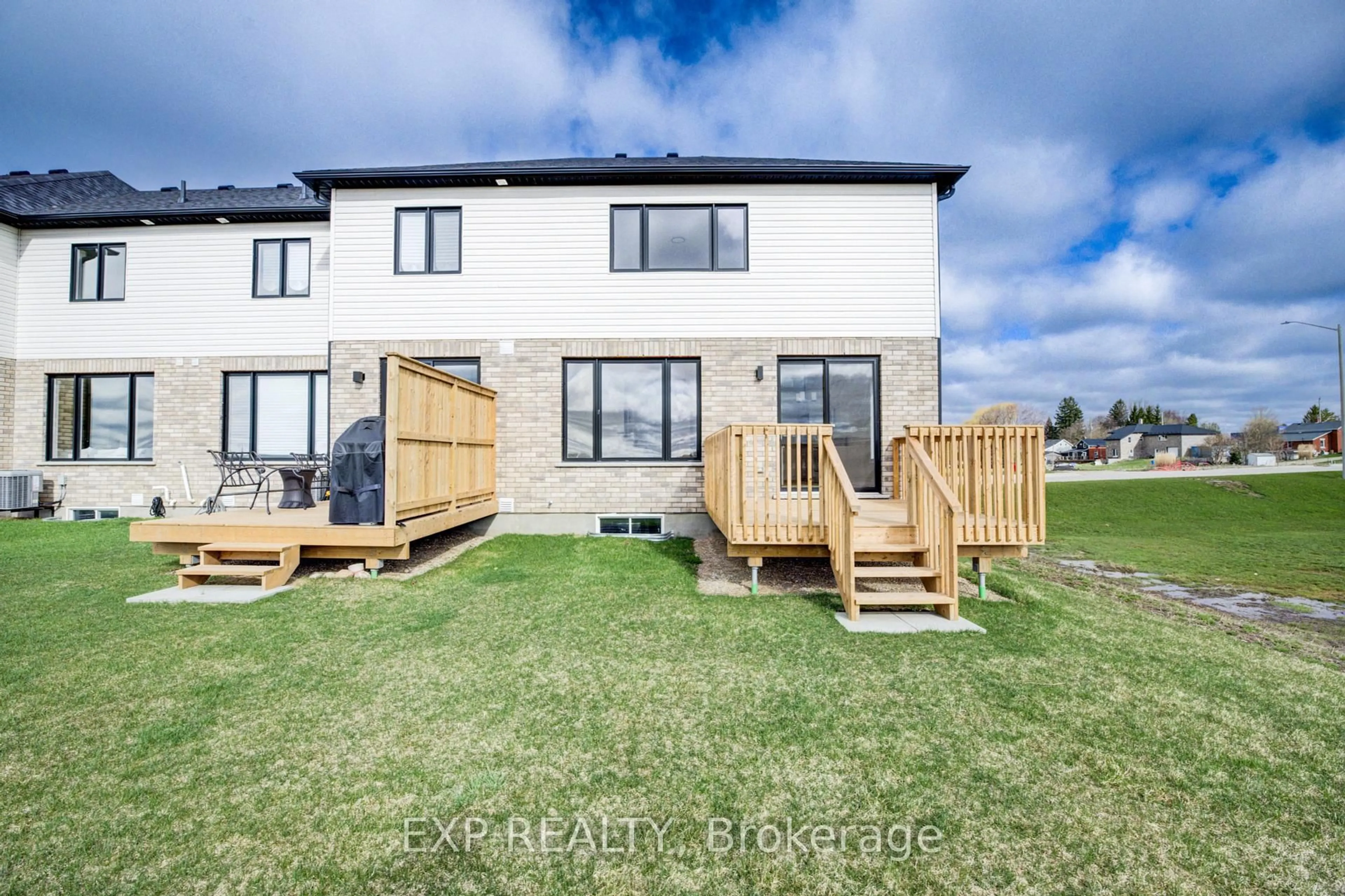 A pic from outside/outdoor area/front of a property/back of a property/a pic from drone, street for 30 Anne St, Minto Ontario N0G 1Z0
