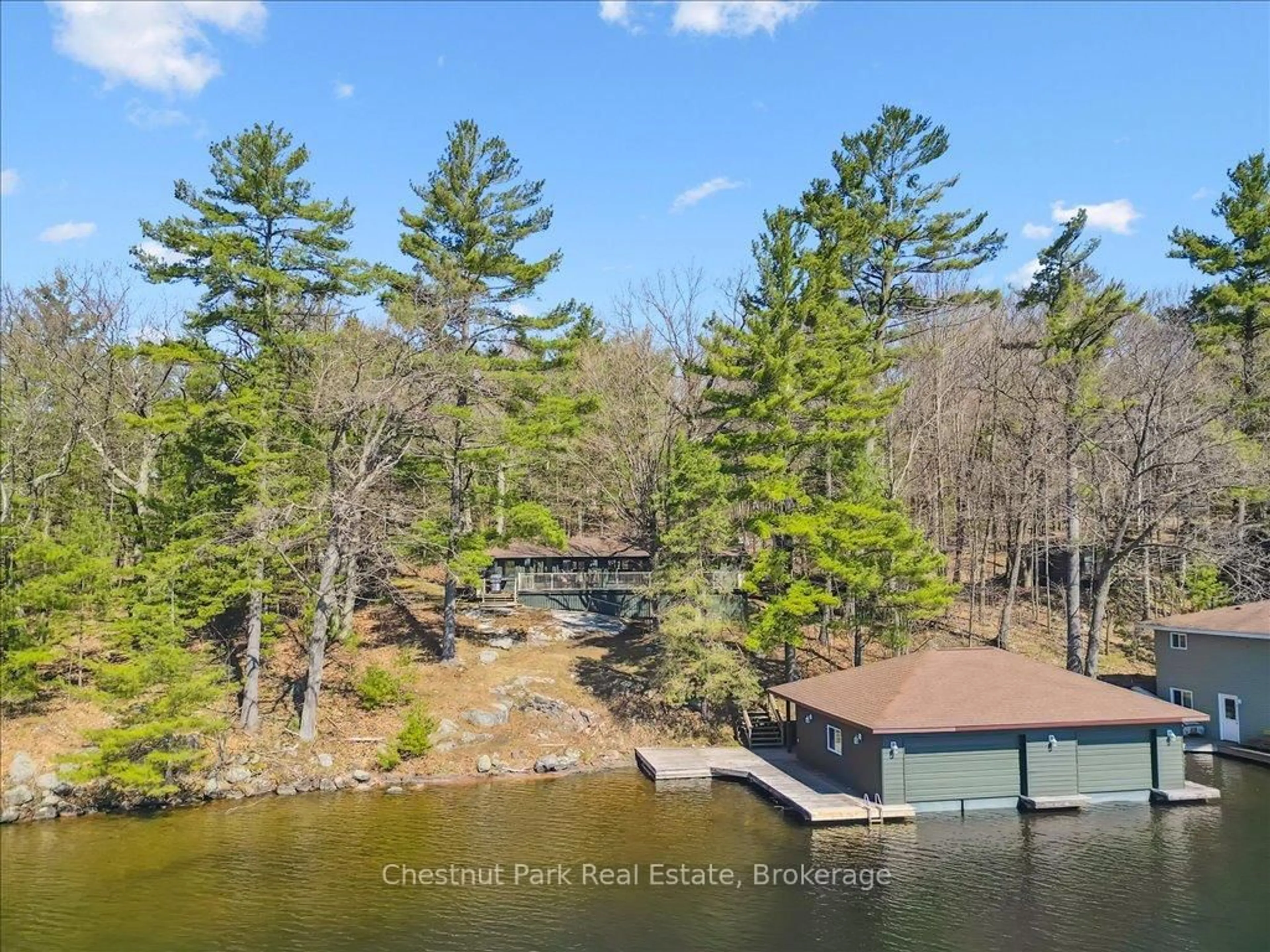 A pic from outside/outdoor area/front of a property/back of a property/a pic from drone, water/lake/river/ocean view for 1049 Sagamo Blvd, Muskoka Lakes Ontario P0B 1J0