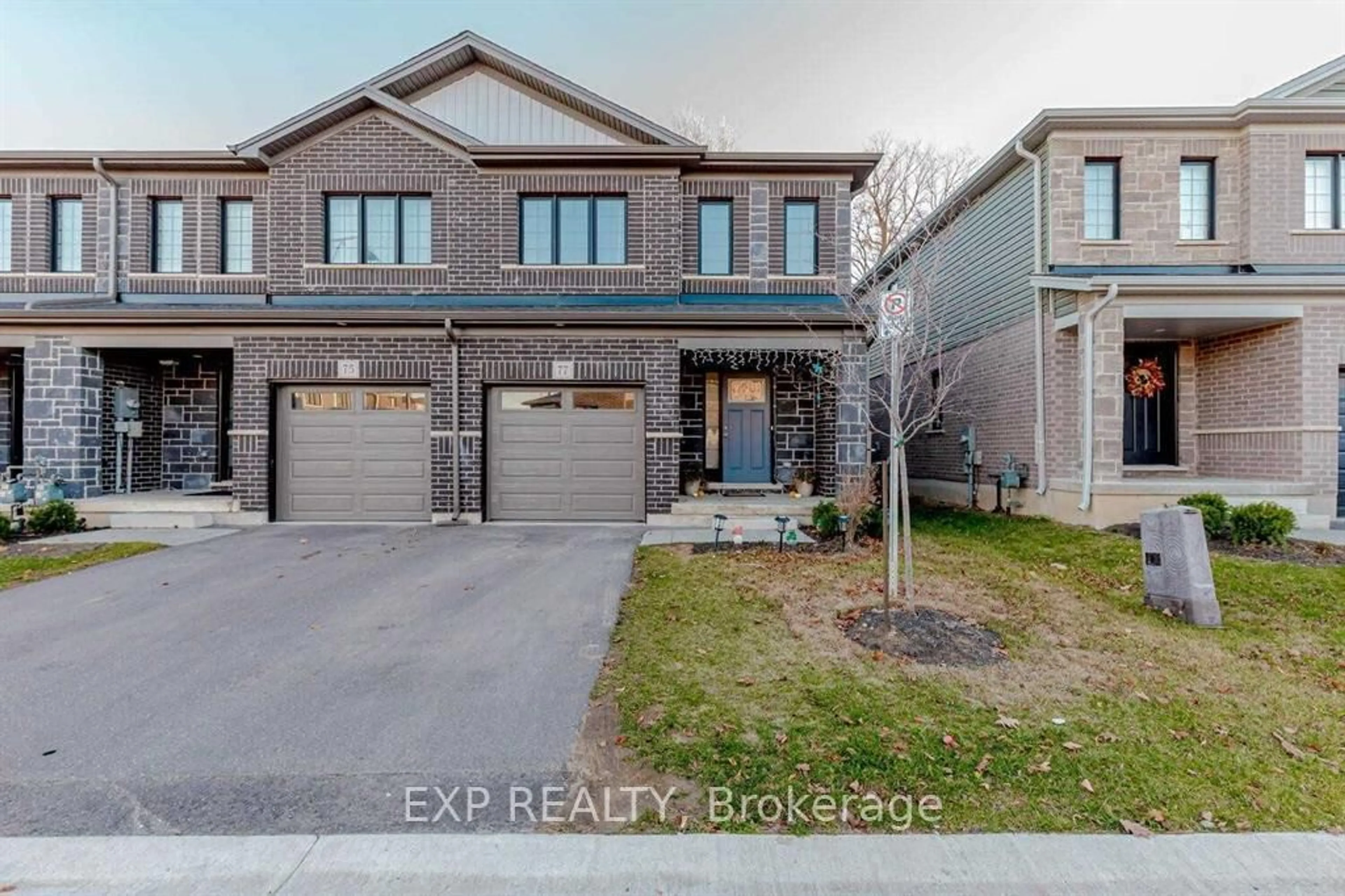 Home with brick exterior material, street for 77 Woodedge Circ, Kitchener Ontario N2R 1R7