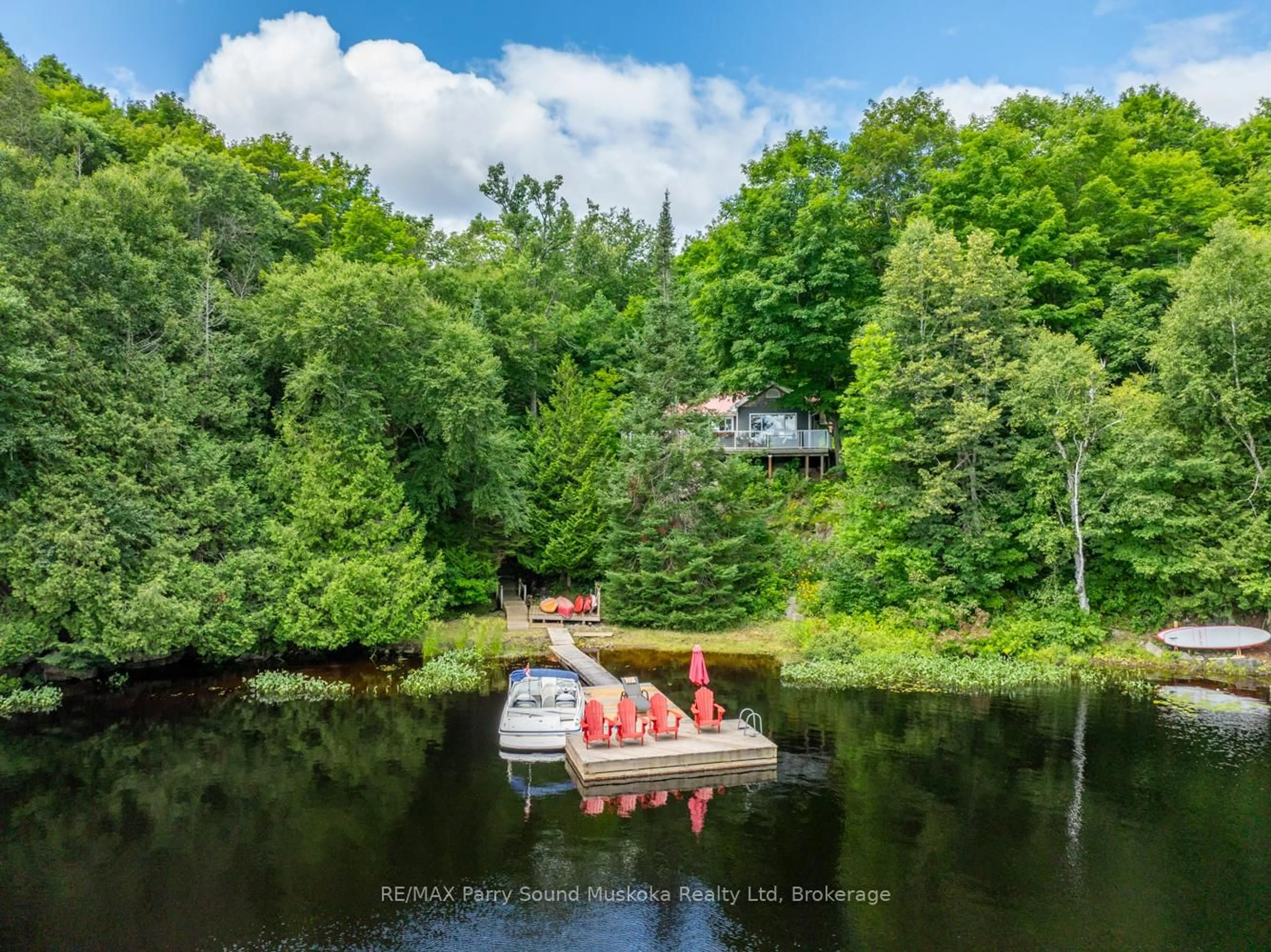 A pic from outside/outdoor area/front of a property/back of a property/a pic from drone, water/lake/river/ocean view for 74 CAPTAIN ESTATES RD N/A, Whitestone Ontario P0A 1G0