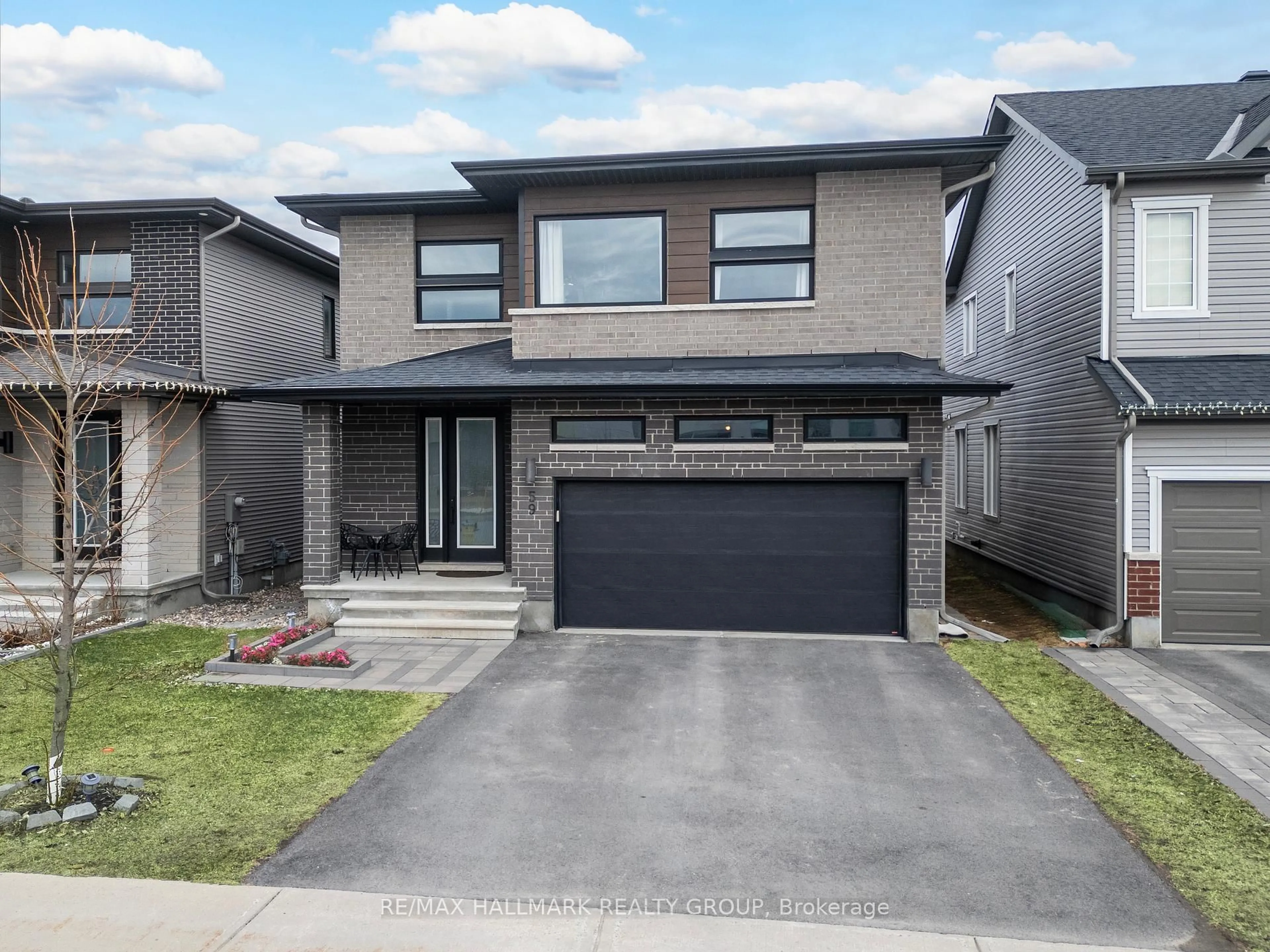 Home with brick exterior material, street for 59 Defence St, Ottawa Ontario K2V 0N3
