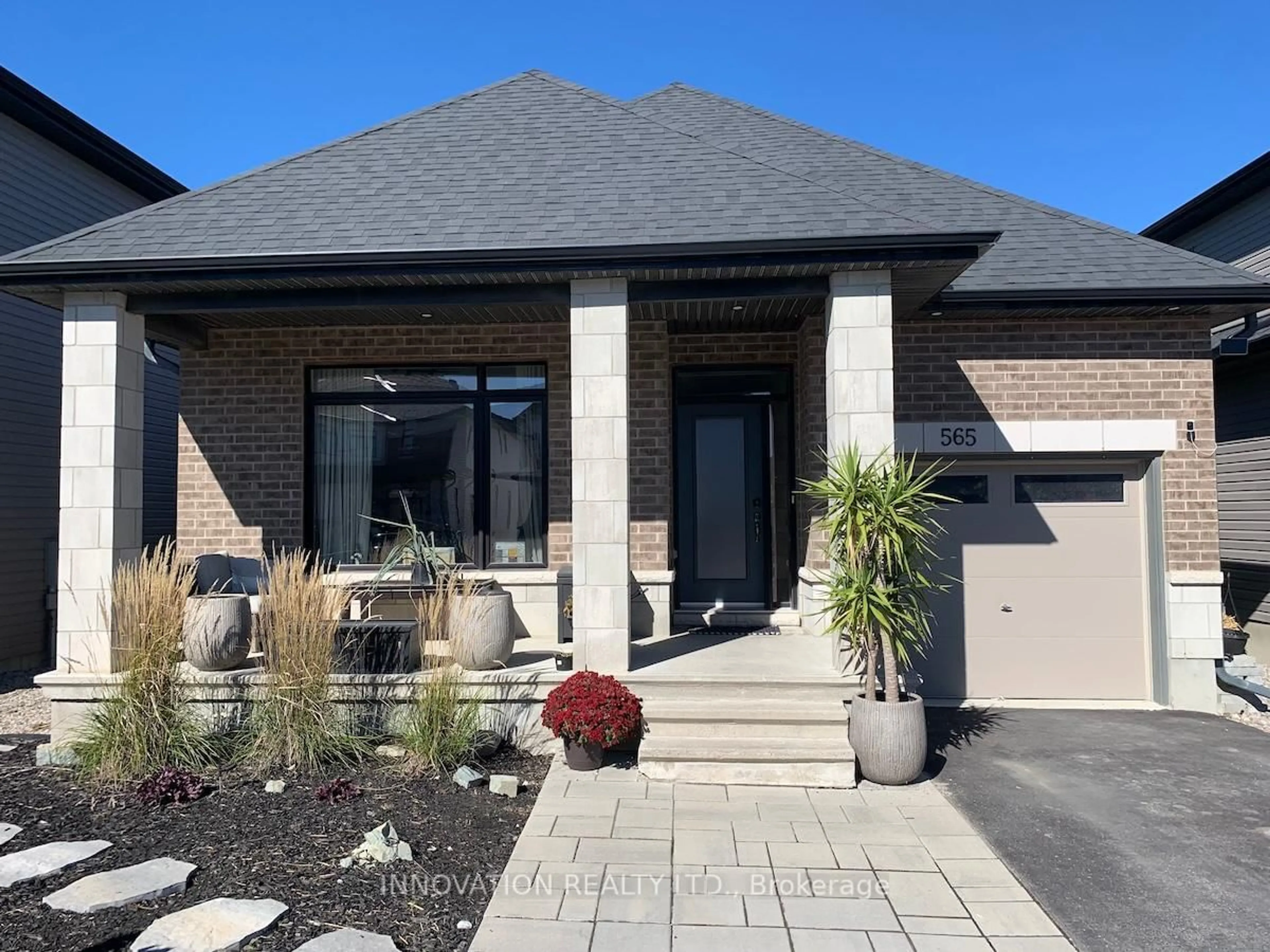 Home with brick exterior material, street for 565 Bobolink Rdge, Ottawa Ontario K2S 2P4