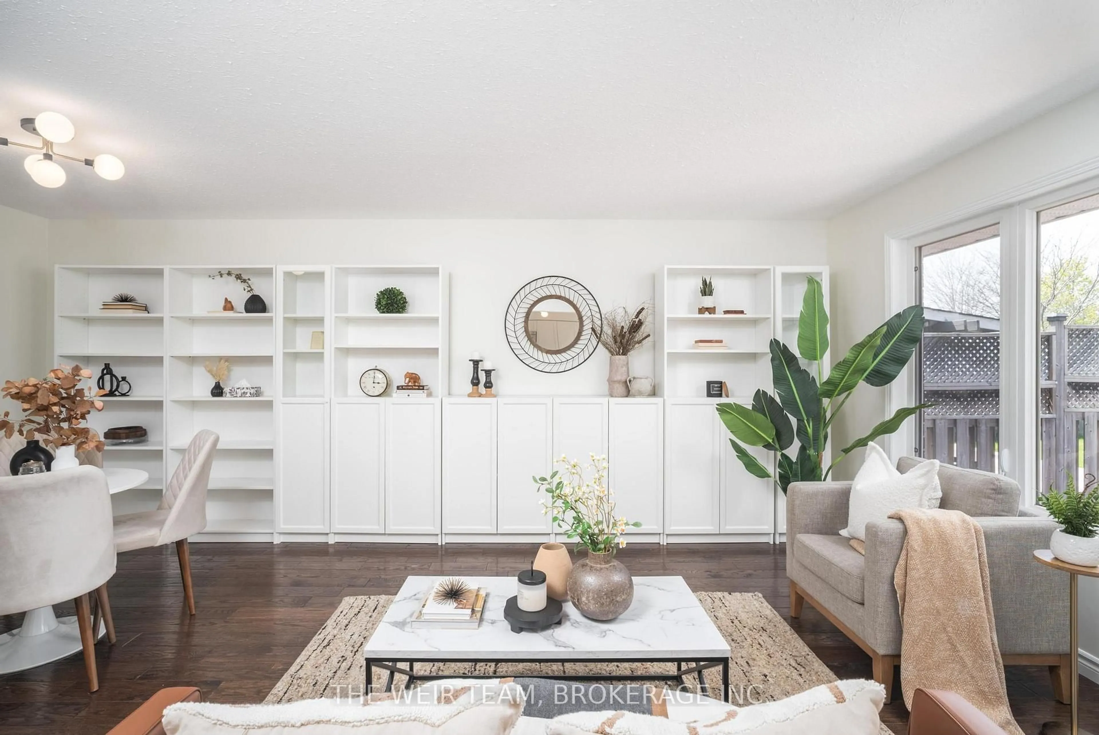 Living room with furniture, wood/laminate floor for 24 Maude Lane, Guelph Ontario N1E 0G3