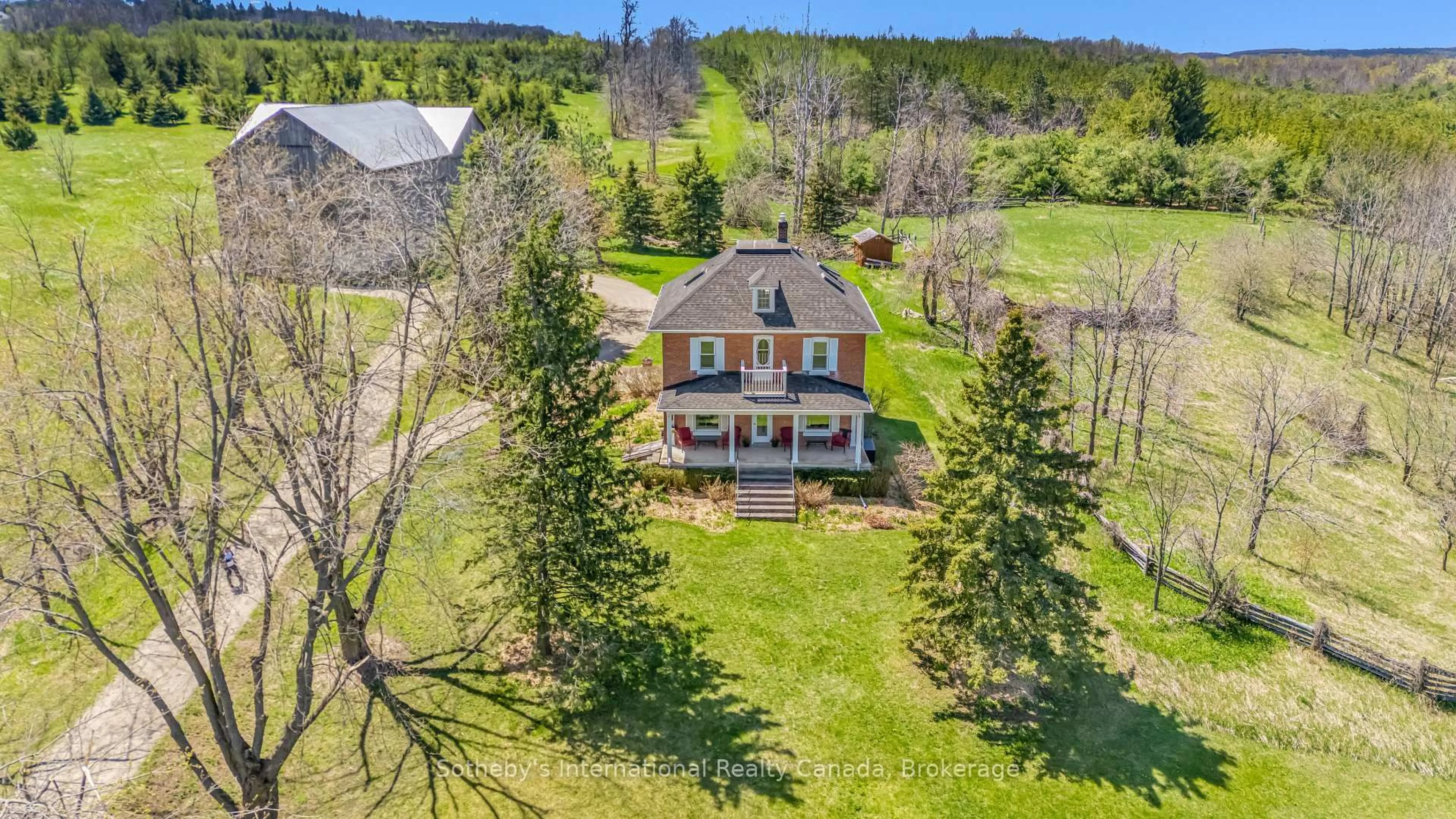 A pic from outside/outdoor area/front of a property/back of a property/a pic from drone, unknown for 717218 1st Line, Mulmur Ontario L9V 0G2